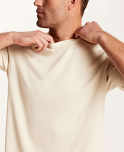Model wearing a Horizontal Rib Tee in Cream, showcasing the subtle ribbing and lightweight fabric.