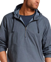 Distressed Poplin Hooded Pullover in Indigo worn by a model, showcasing its relaxed silhouette and half-zip design.