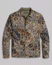 Floral Print Twill Trucker in Olive showcasing a muted floral pattern and tailored silhouette.