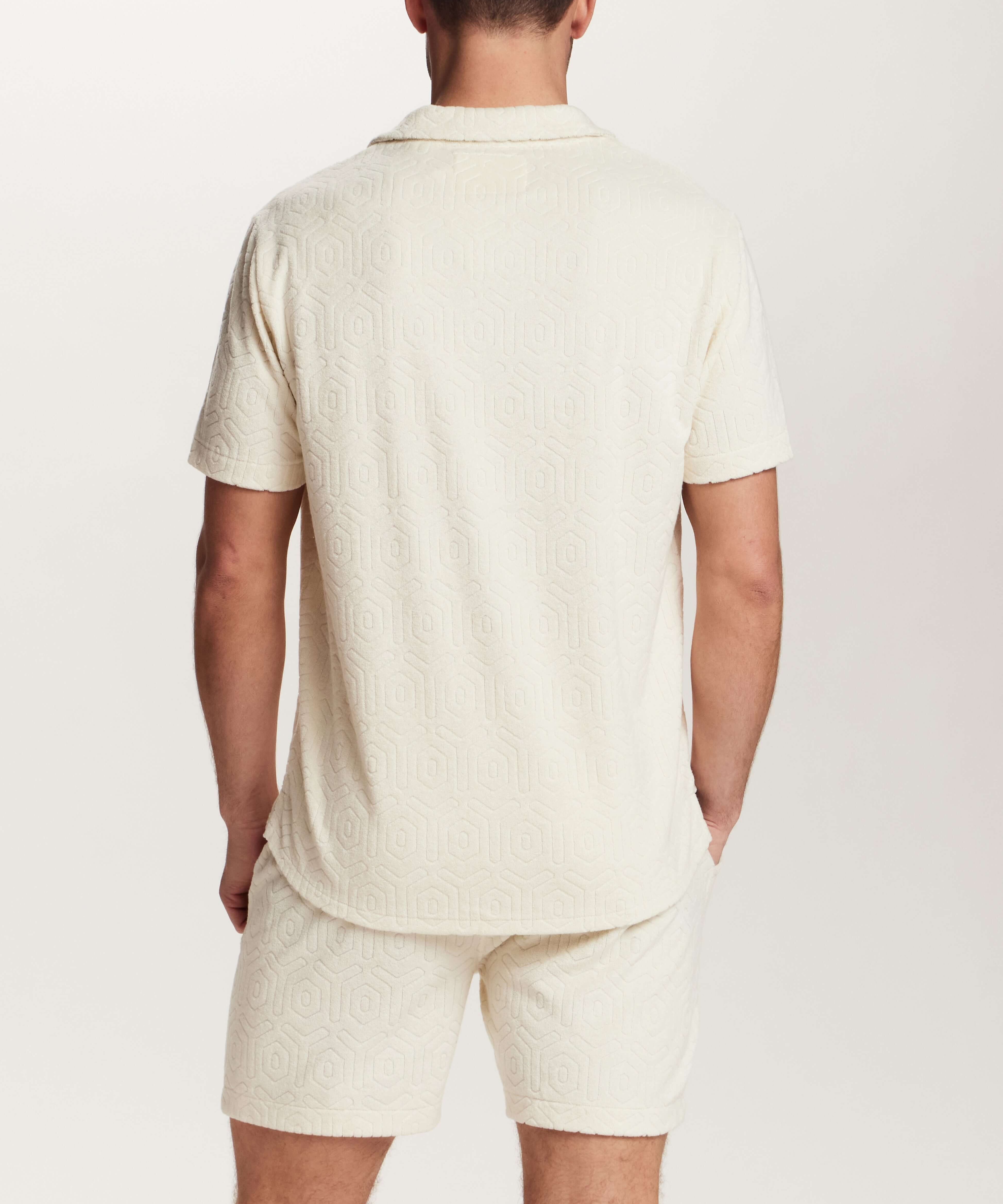 Geometric Terry Camp Shirt in Stone worn by model, showcasing relaxed fit and subtle geometric pattern.