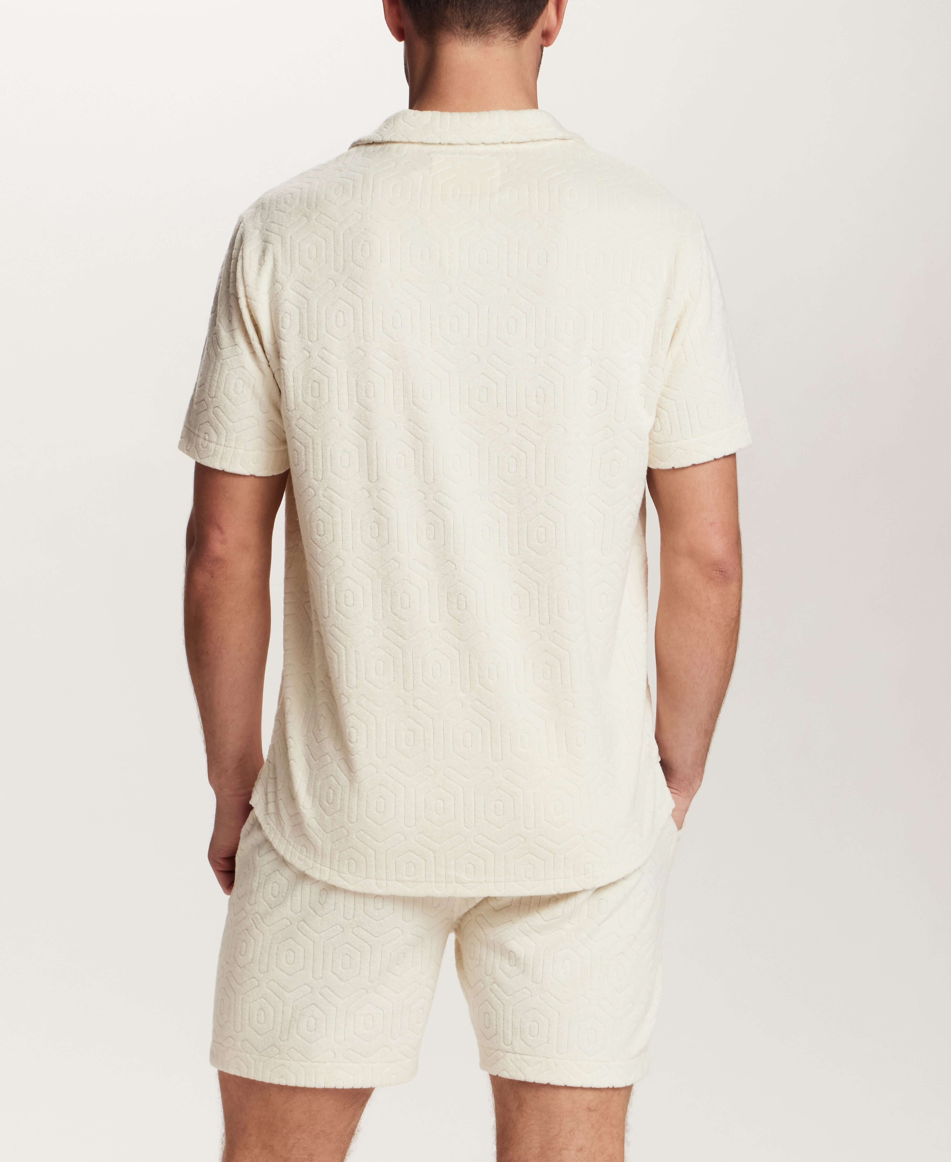 Geometric Terry Camp Shirt in Stone worn by model, showcasing relaxed fit and subtle geometric pattern.