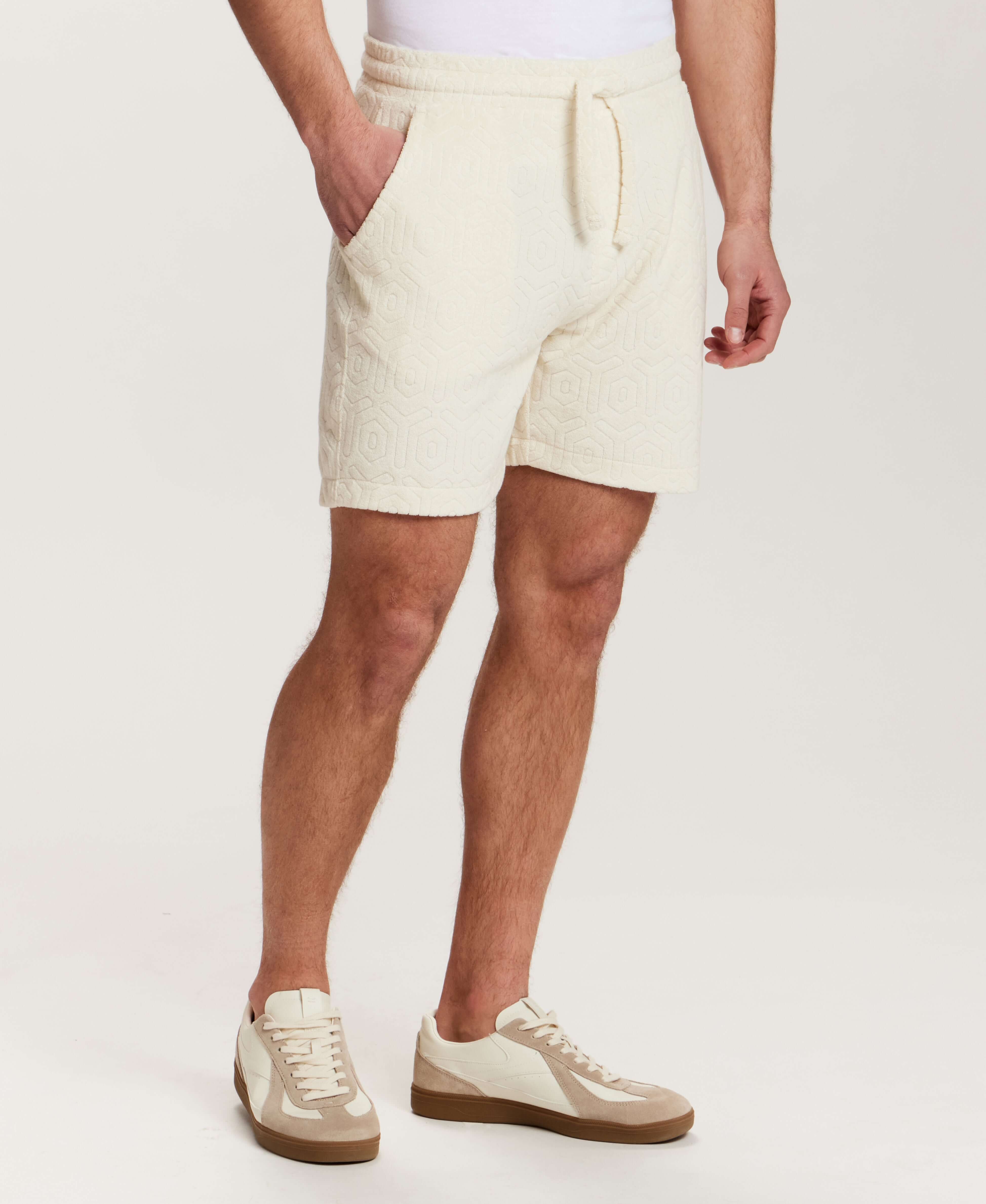 Geometric Terry Drawstring Short in Stone displayed on model showcasing soft fabric and casual fit.