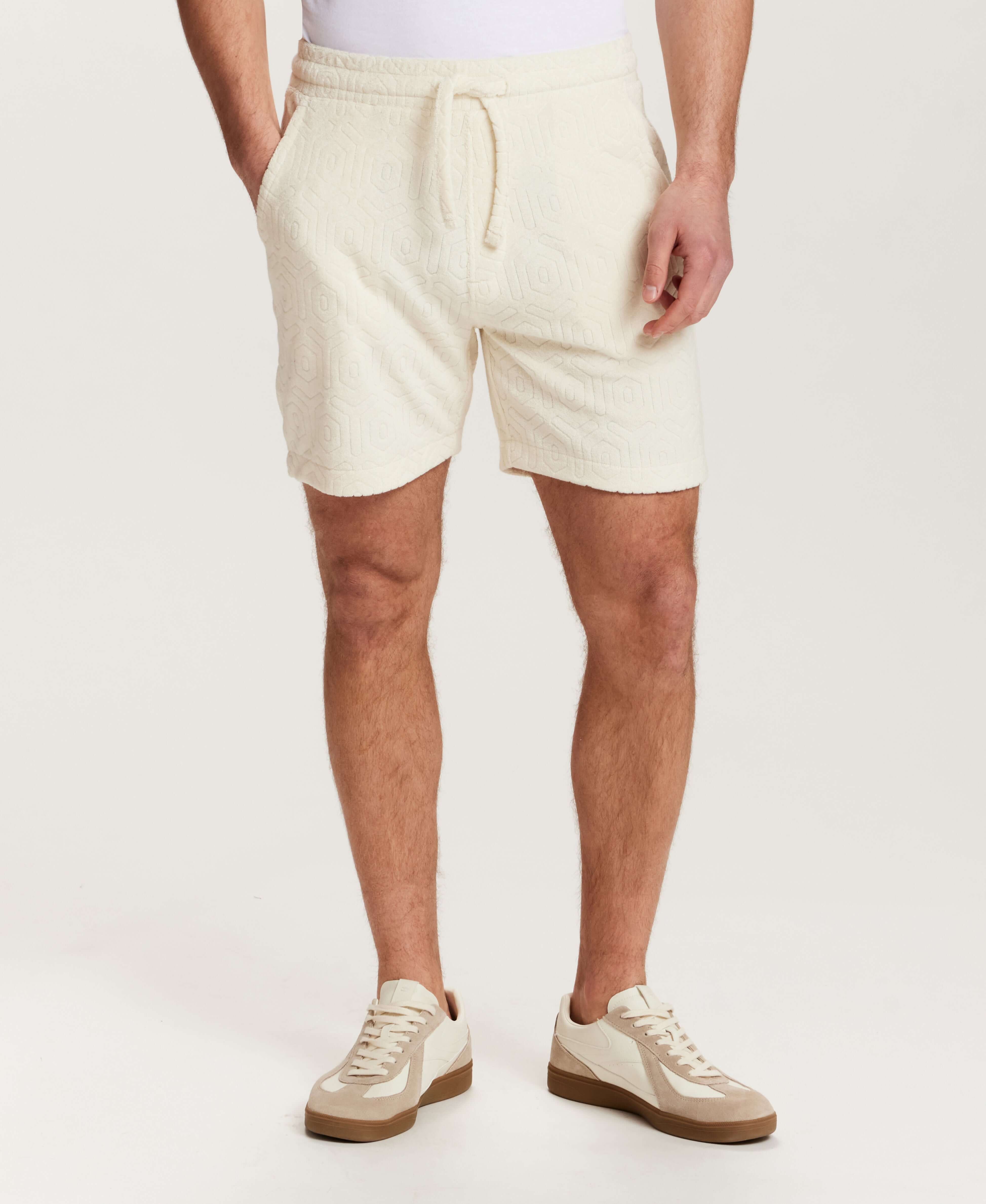 Geometric Terry Drawstring Short in Stone, featuring soft fabric and side pockets for a comfortable fit.