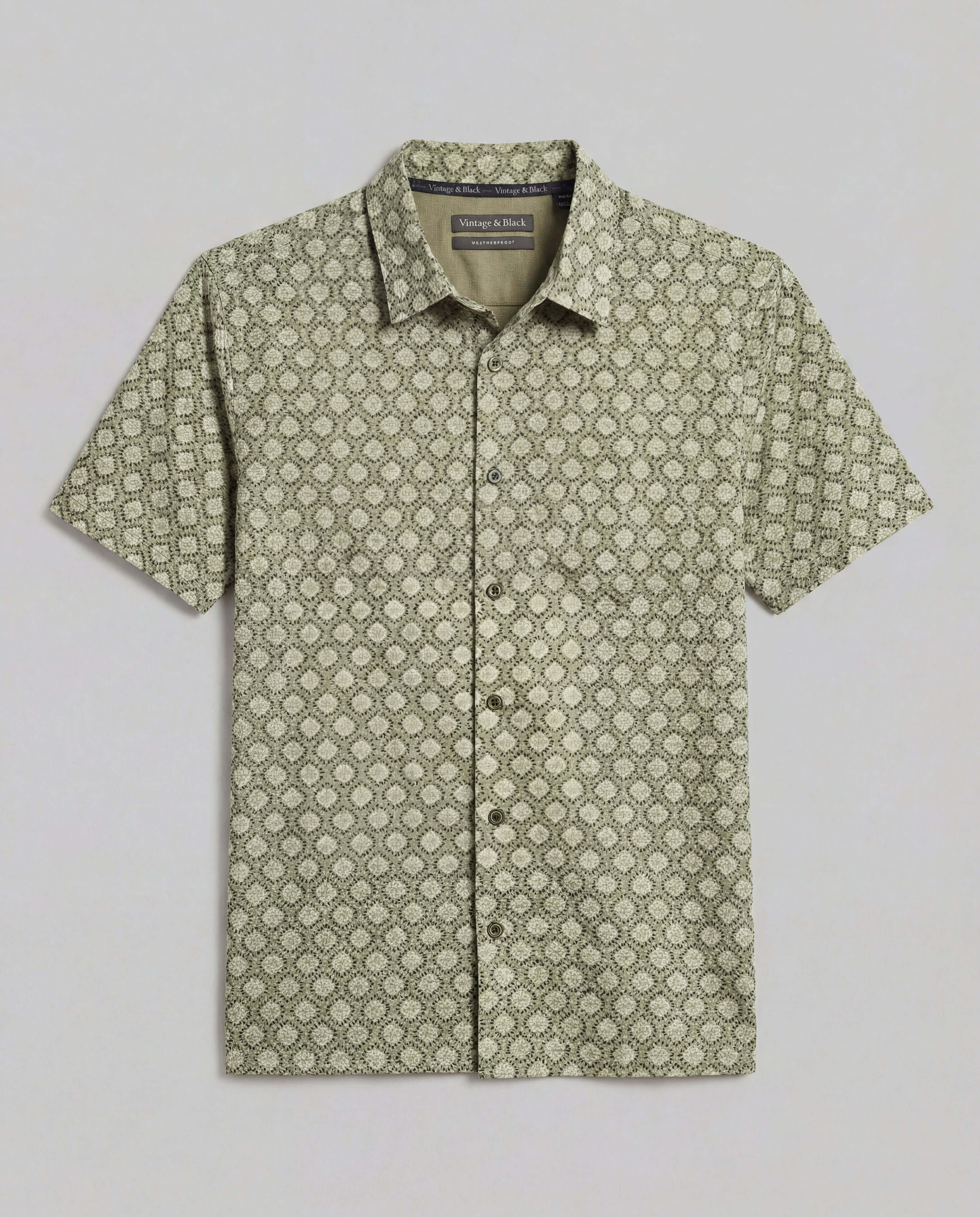 The Medallion Print Seersucker Shirt in Green featuring a subtle medallion pattern and tailored short sleeve design.