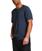 Horizontal Rib Tee in Navy worn by a model, showcasing its soft modal blend and subtle ribbed texture.