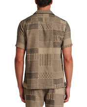 Back view of Jacquard Resort Shirt in Khaki, showcasing textured patterns and relaxed fit.