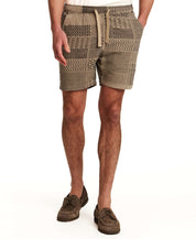 The Patchwork Jacquard Short in Khaki featuring woven patchwork design and elastic drawstring waistband.