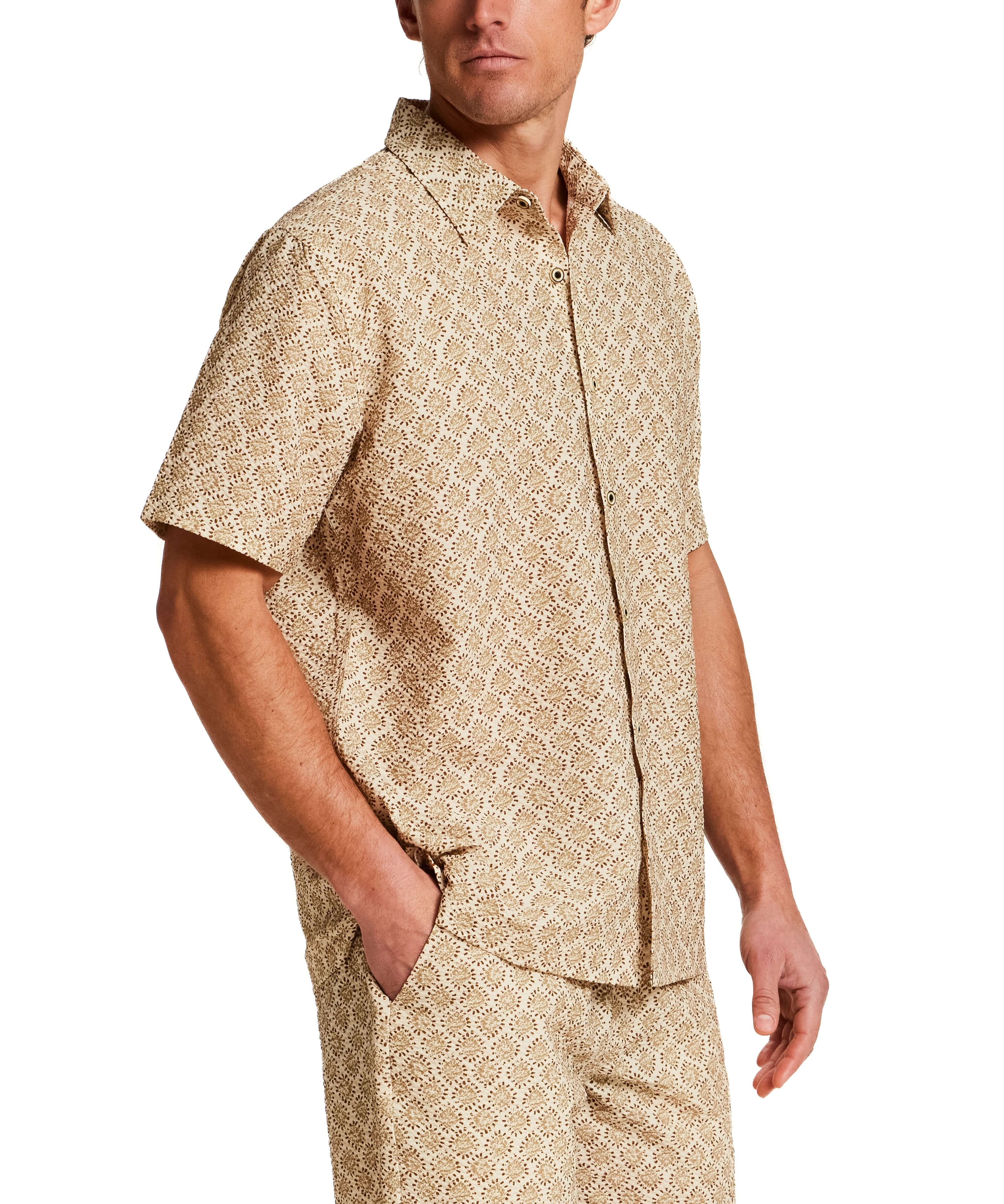 The Medallion Print Seersucker Shirt in Khaki worn by a model, showcasing its textured fabric and stylish design.