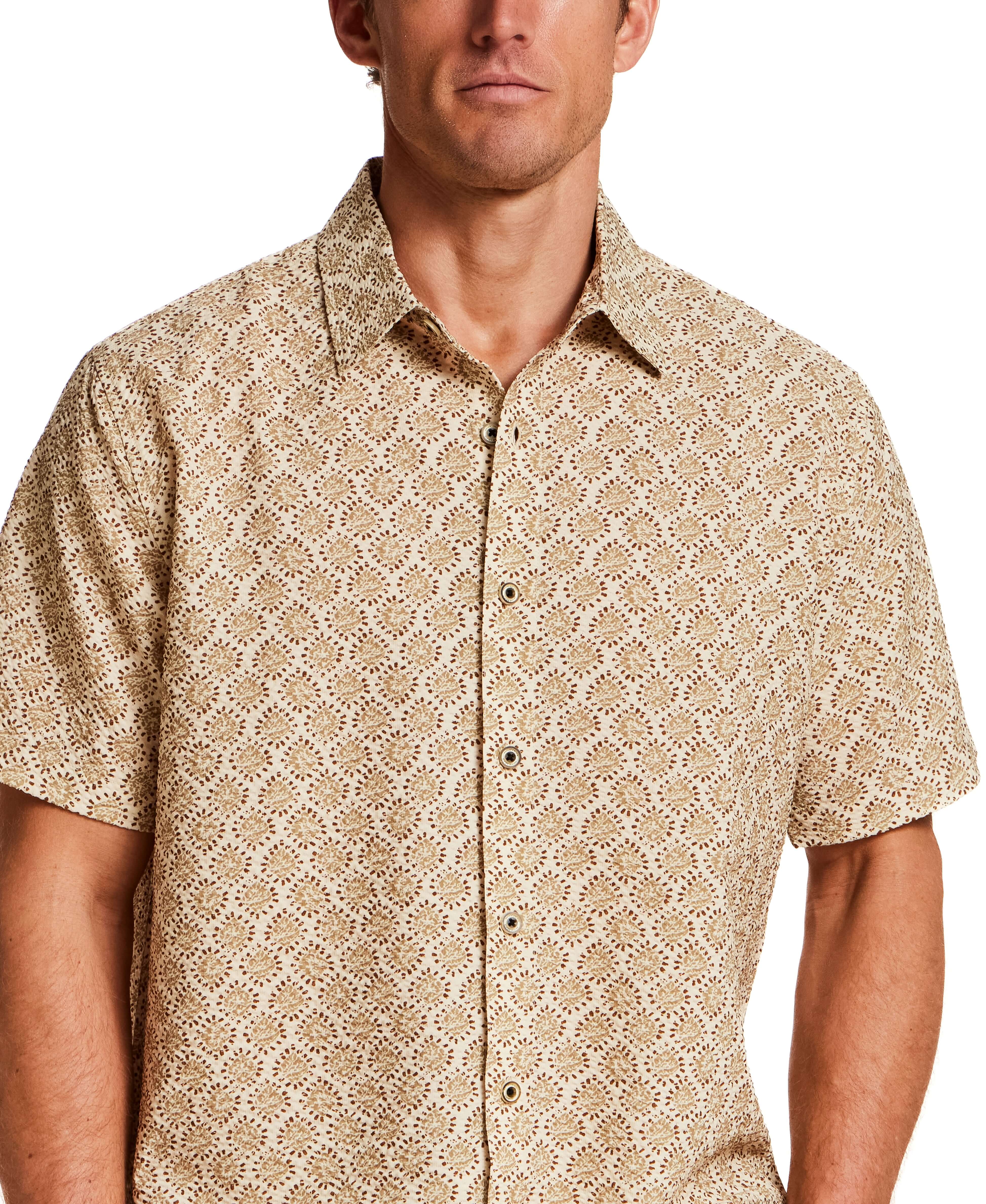 The Medallion Print Seersucker Shirt in Khaki displayed on a model, featuring a subtle seersucker texture and refined medallion print.