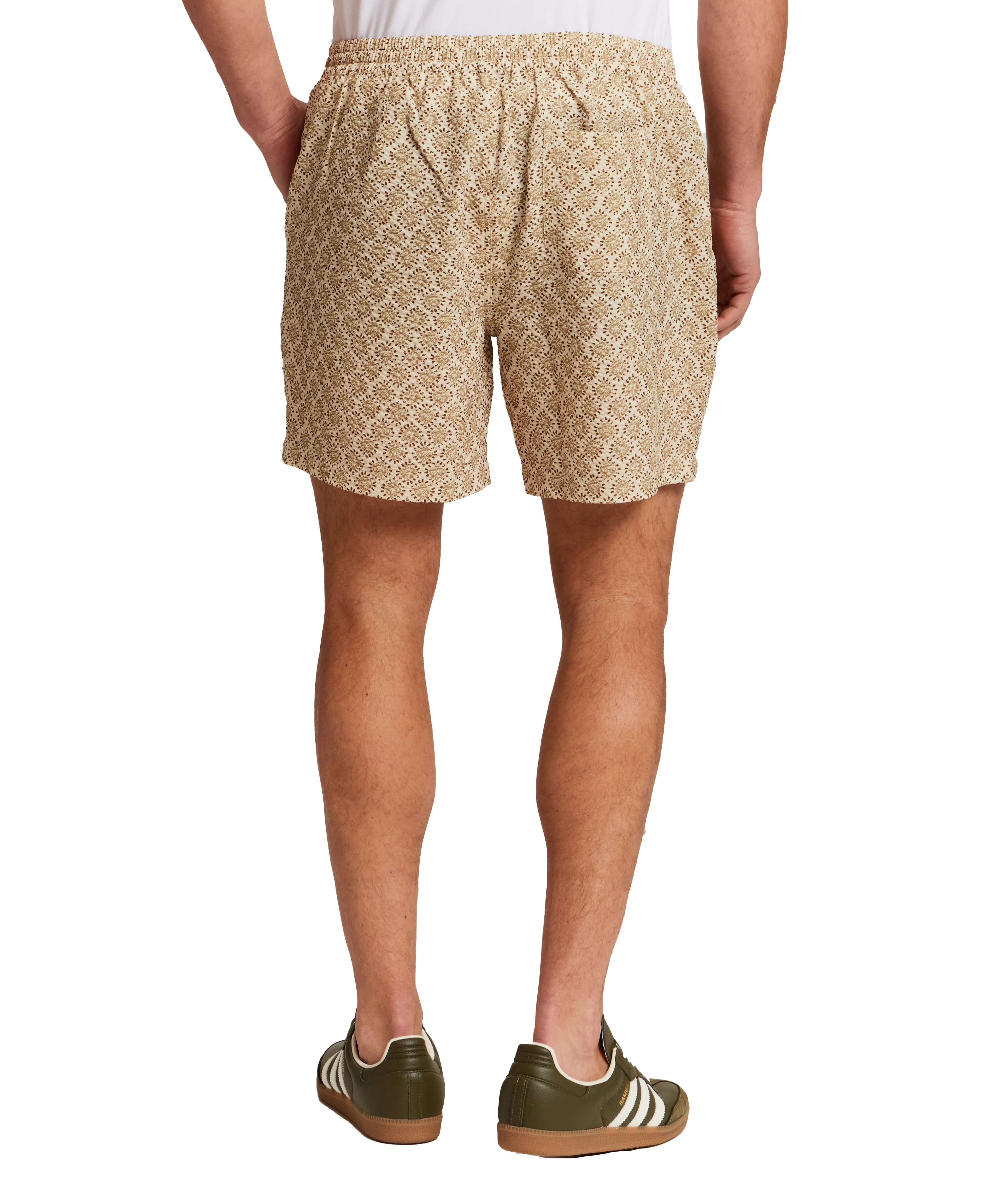 The Medallion Print Seersucker Short in Khaki featuring a comfortable elastic waistband and floral print design.