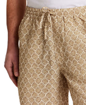 The Medallion Print Seersucker Short in Khaki showcasing elastic waistband and floral print.