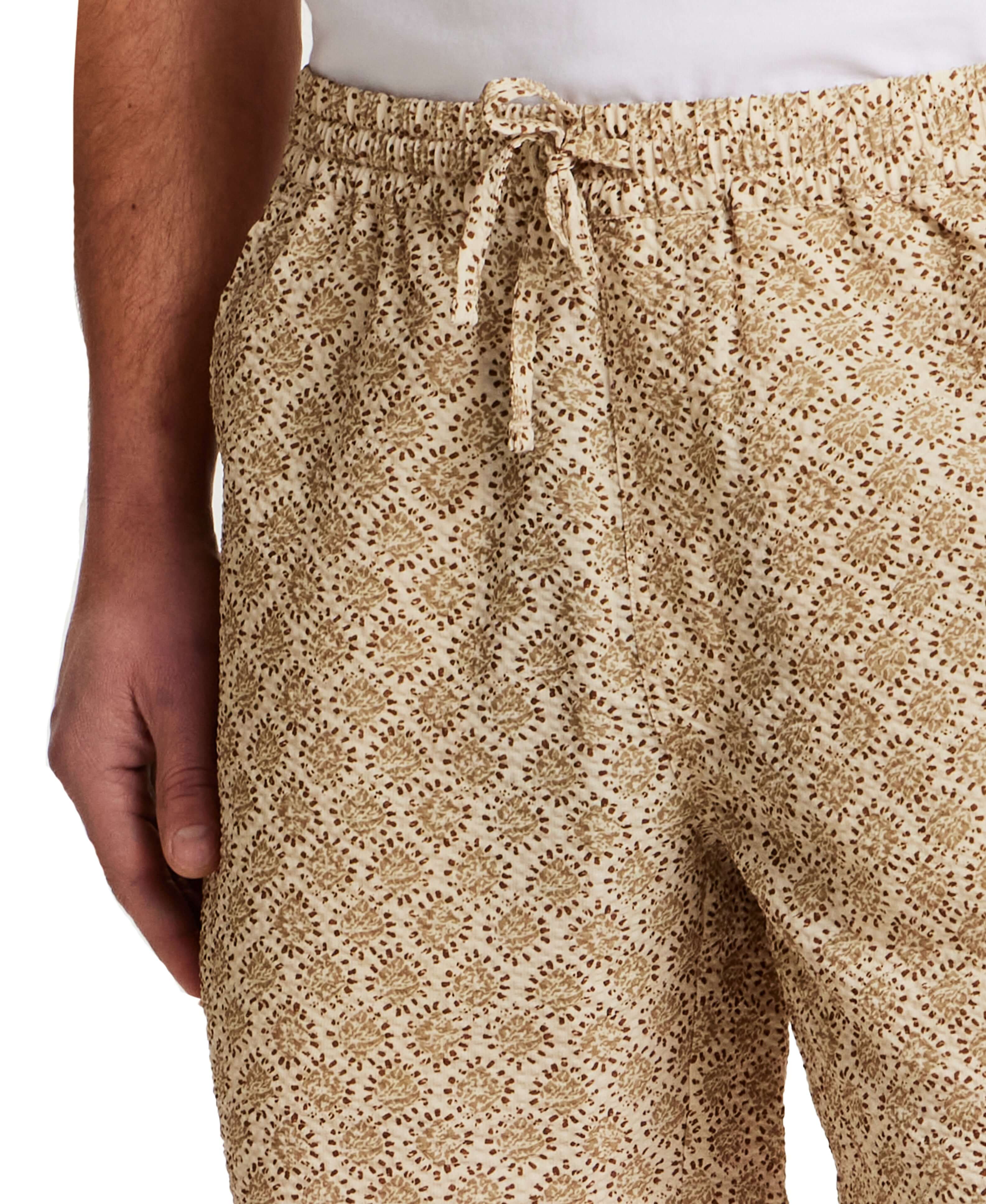 The Medallion Print Seersucker Short in Khaki showcasing elastic waistband and floral print.