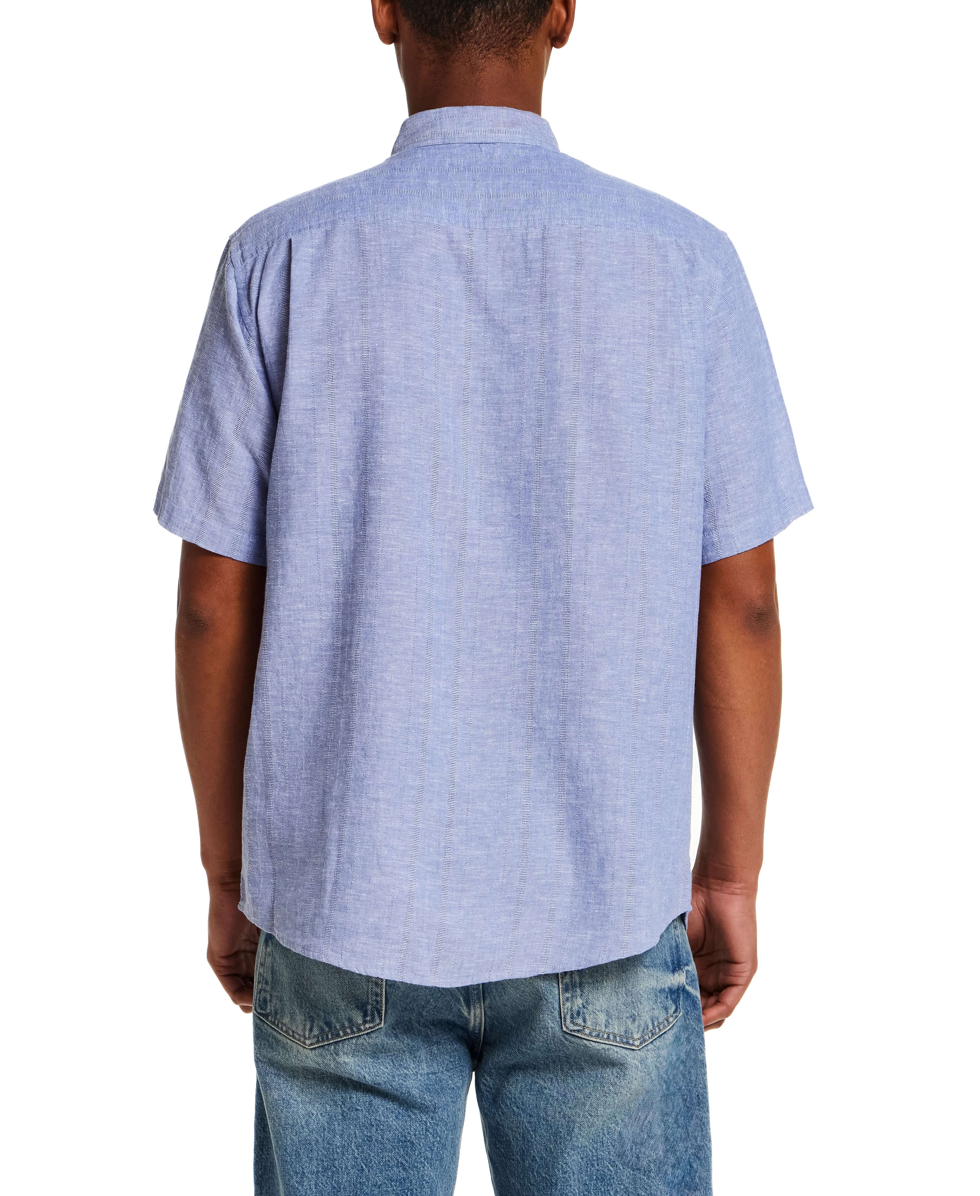 Back view of a man wearing a Linen Blend Dobby Stripe Shirt in Infinity Blue with short sleeves and button-down collar.