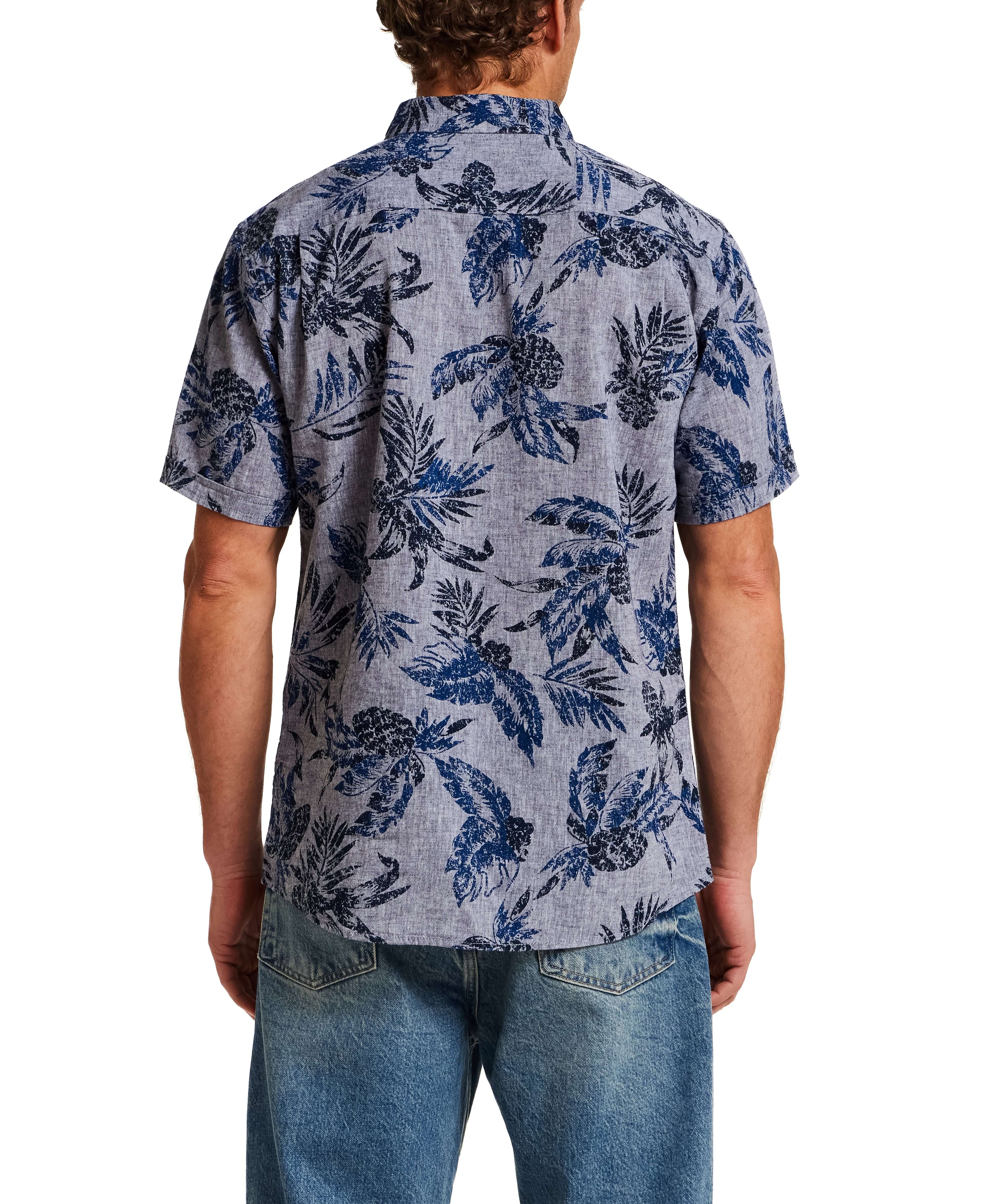 The Linen Cotton Print Shirt in Dress Blue showcasing the back with a blue floral design.
