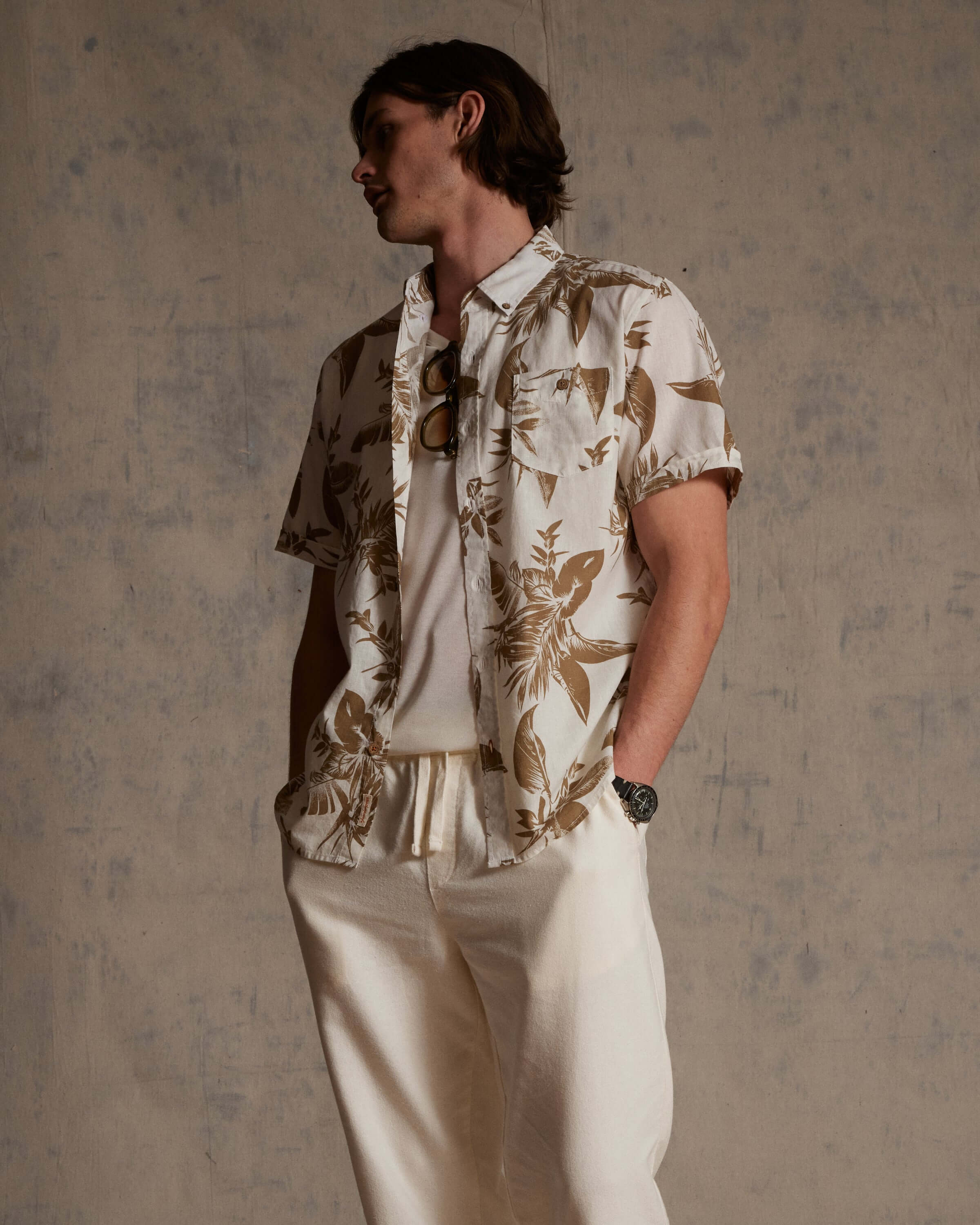 The Linen Cotton Print Shirt in Peanut worn by model, showcasing abstract floral design and relaxed fit.