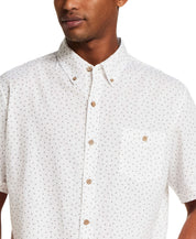 The Linen Cotton Print Shirt in Snow White featuring an abstract floral pattern, button-down style, and relaxed fit.
