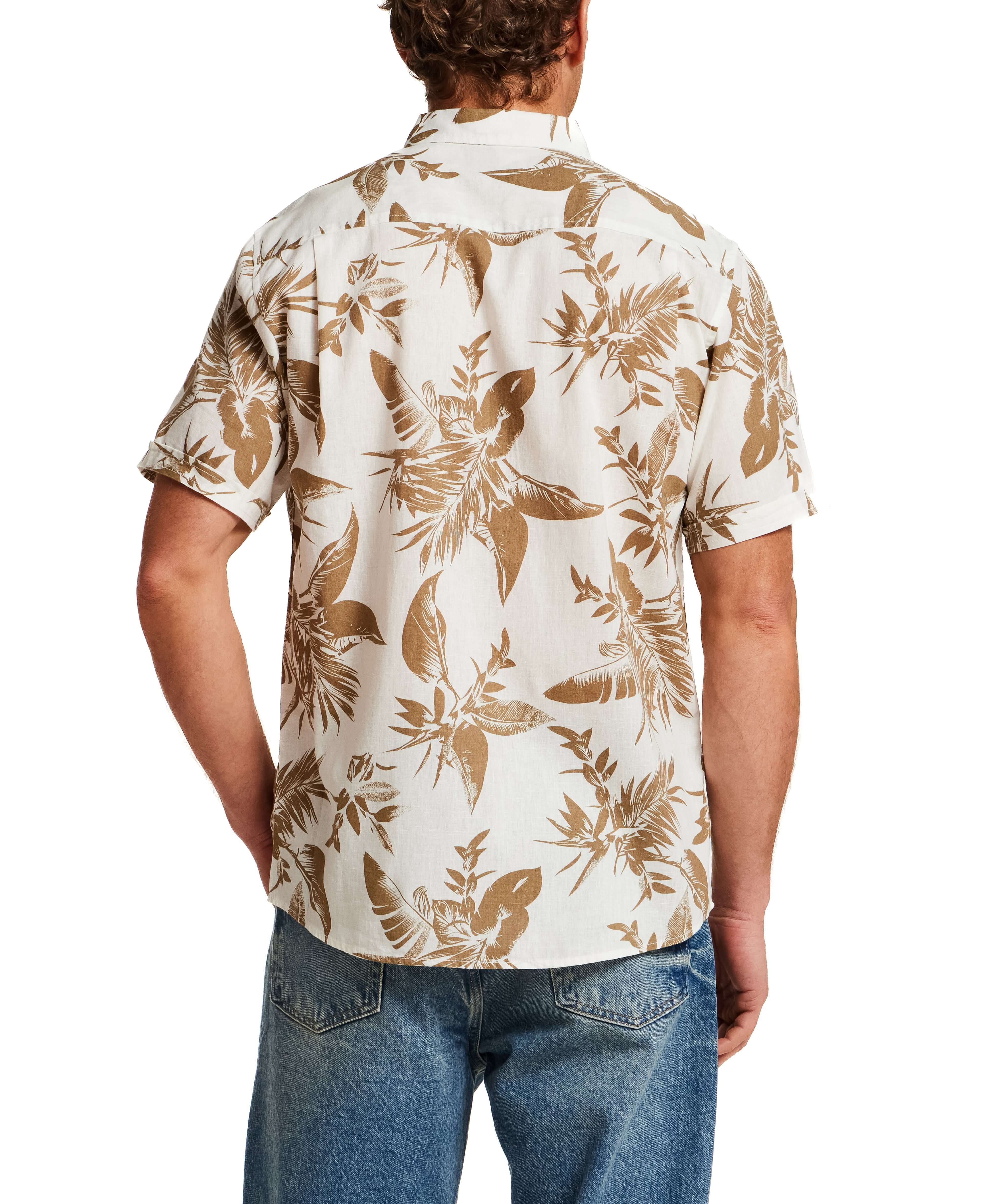 The Linen Cotton Print Shirt in Peanut displayed from the back with abstract floral print and short sleeves.