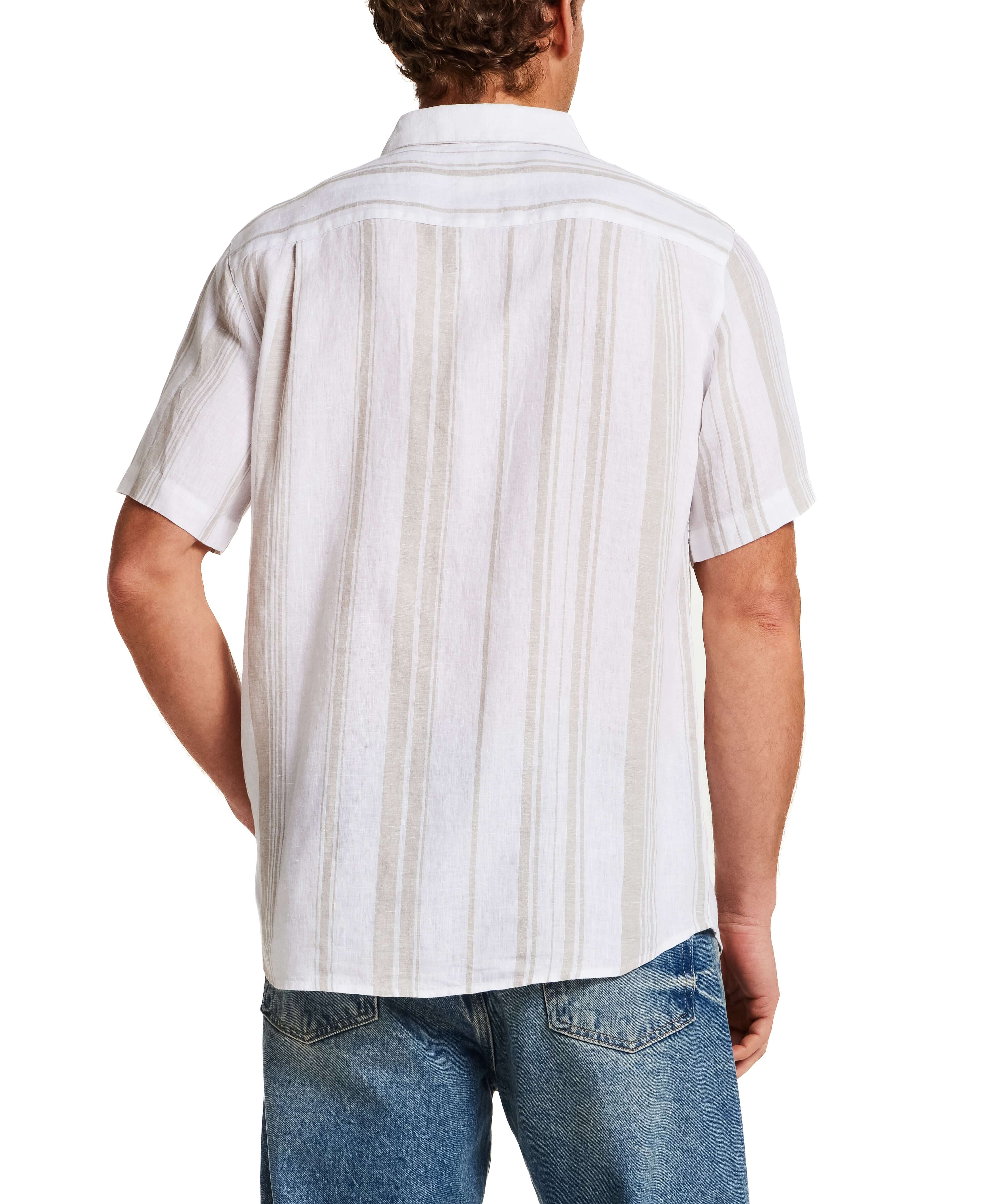 Back view of a man wearing a 100% Linen Shirt in Natural Stripe, highlighting the stripe pattern and short sleeves.