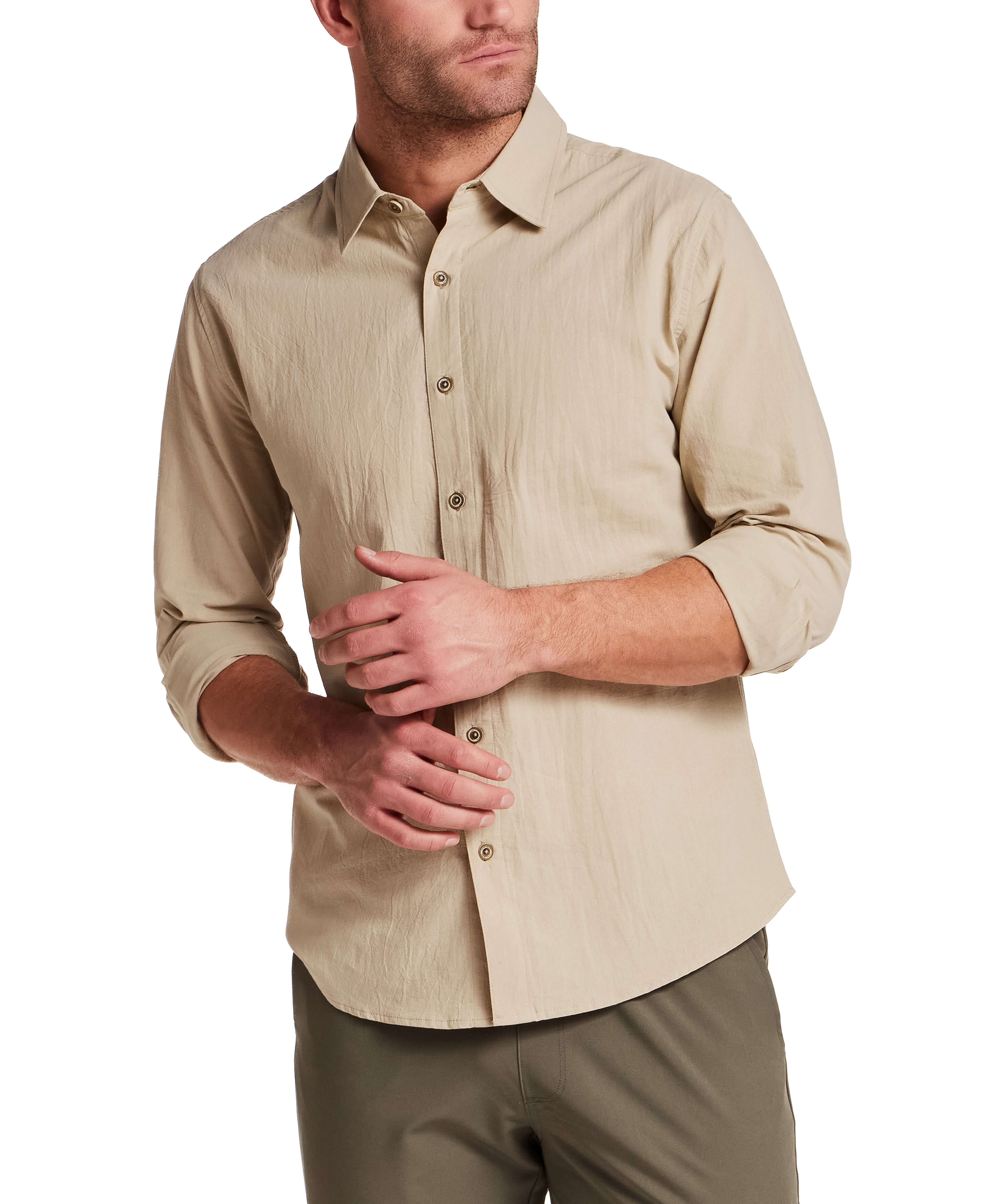 Model wearing a Long Sleeve Cotton Sheeting Shirt in Khaki, showcasing its lightweight and breathable design.