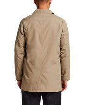 Back view of the Mid Length Commuter Trench in Khaki, showcasing its clean lines and tailored cut.