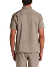 Back view of Mini Seersucker Shirt in Khaki, showcasing lightweight seersucker texture and structured collar.