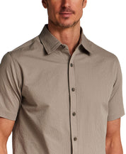Mini Seersucker Shirt in Khaki displayed on model, featuring lightweight fabric and refined drape, perfect for versatile styling.
