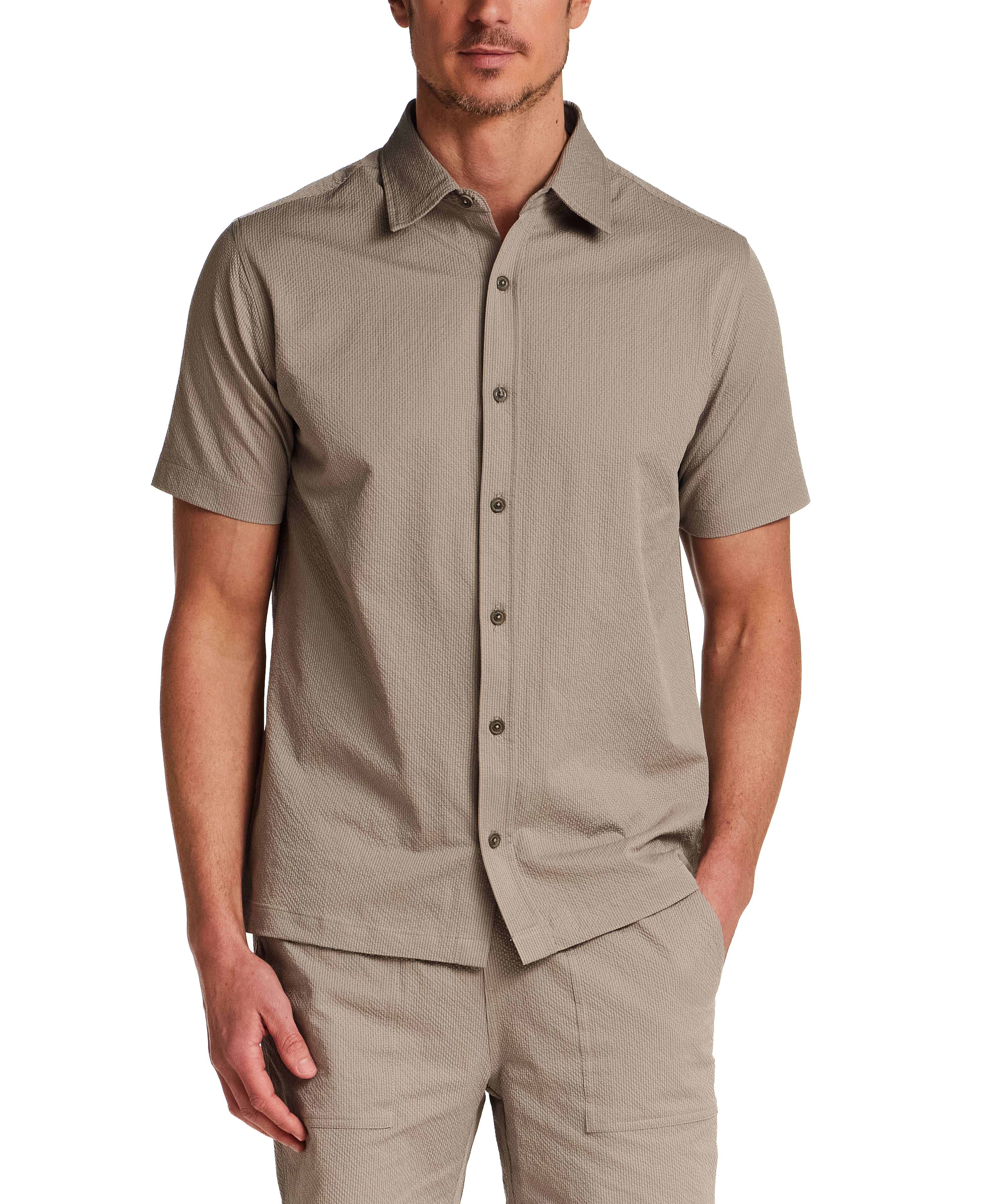 Mini Seersucker Shirt in Khaki worn by a model, showcasing its lightweight texture and structured collar.