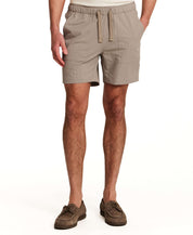 Mini Seersucker Short in Khaki worn by a model, showcasing the lightweight and tailored design.
