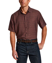 Petal Print Short-Sleeve Shirt modeled by a man wearing dark jeans, showcasing a subtle petal print design.