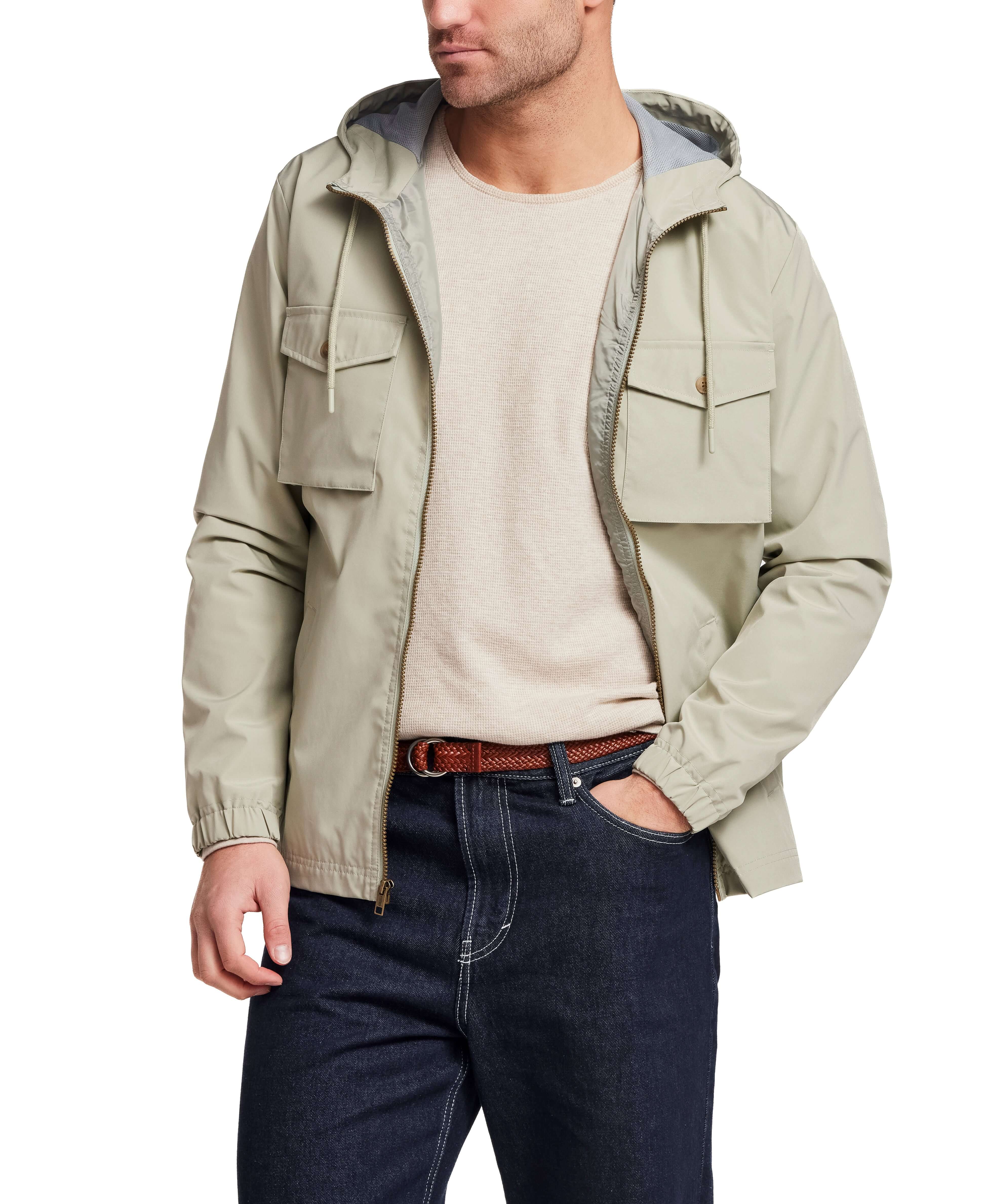 Poly Memory Safari Jacket with Hood in Sea Grass worn by a model showcasing its lightweight design and hooded feature.