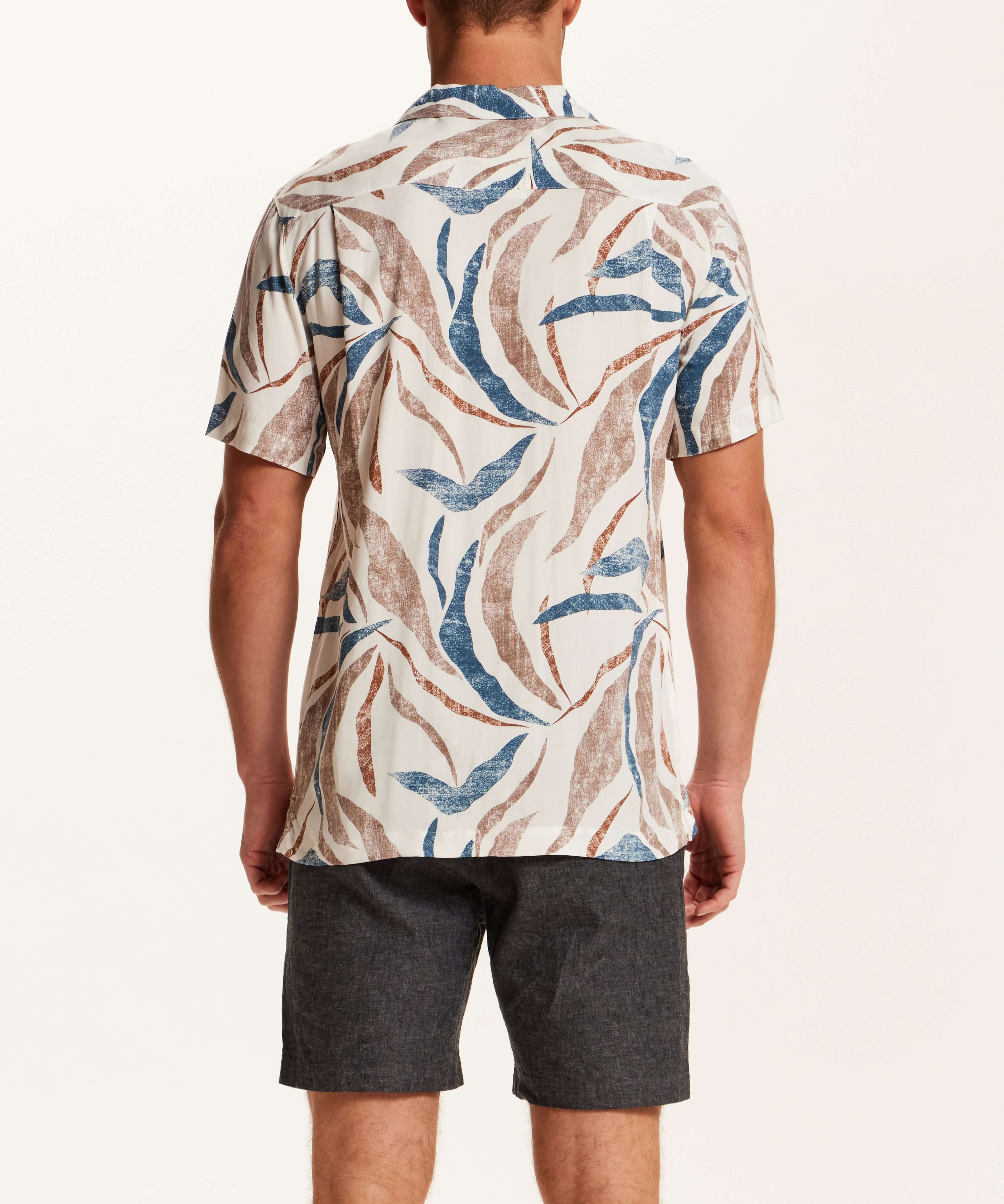 Short Sleeve Rayon Printed Camp Shirt in Marsala showcasing a retro pattern and trendy camp collar from the back view.
