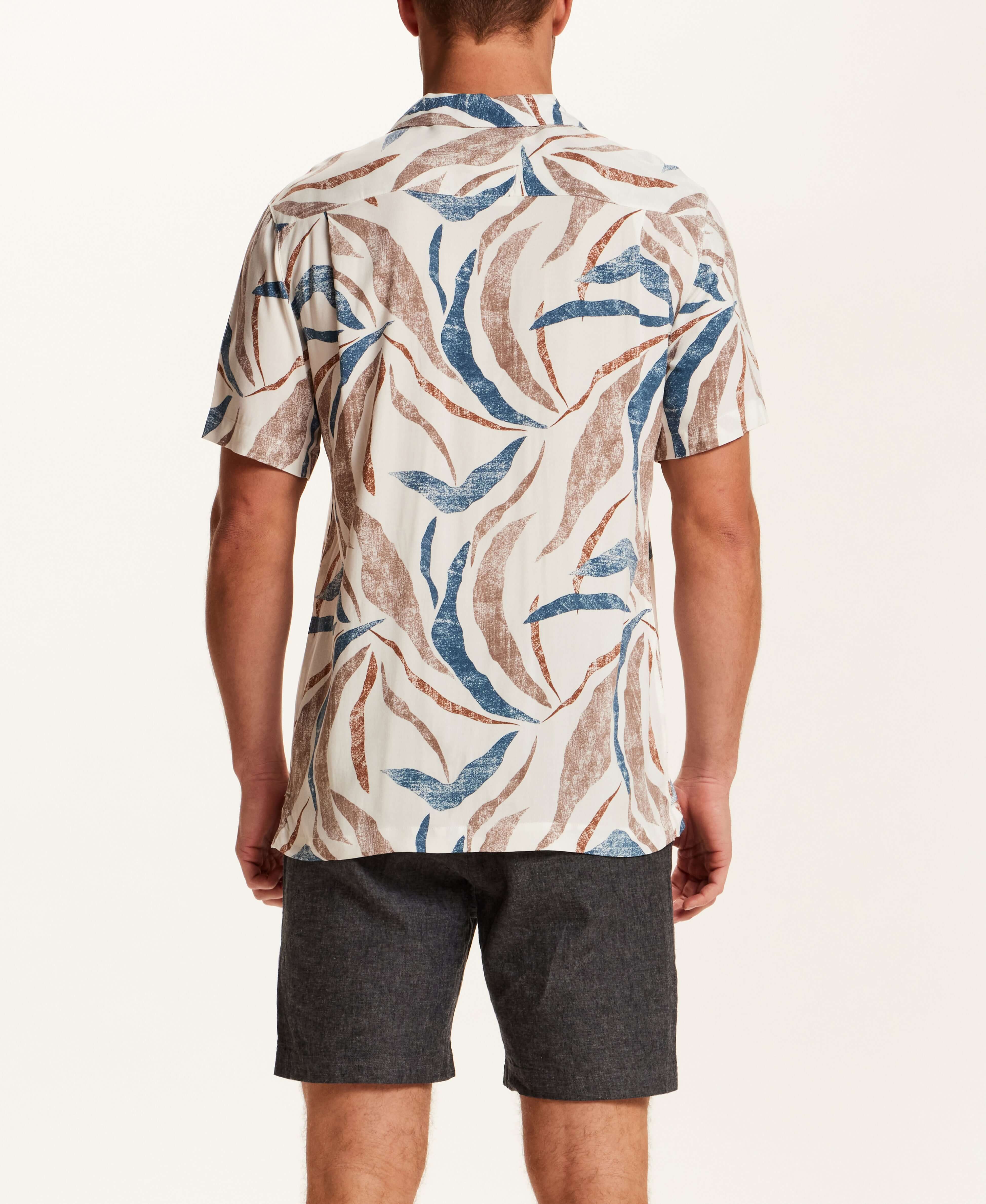 Short Sleeve Rayon Printed Camp Shirt in Marsala showcasing a retro pattern and trendy camp collar from the back view.