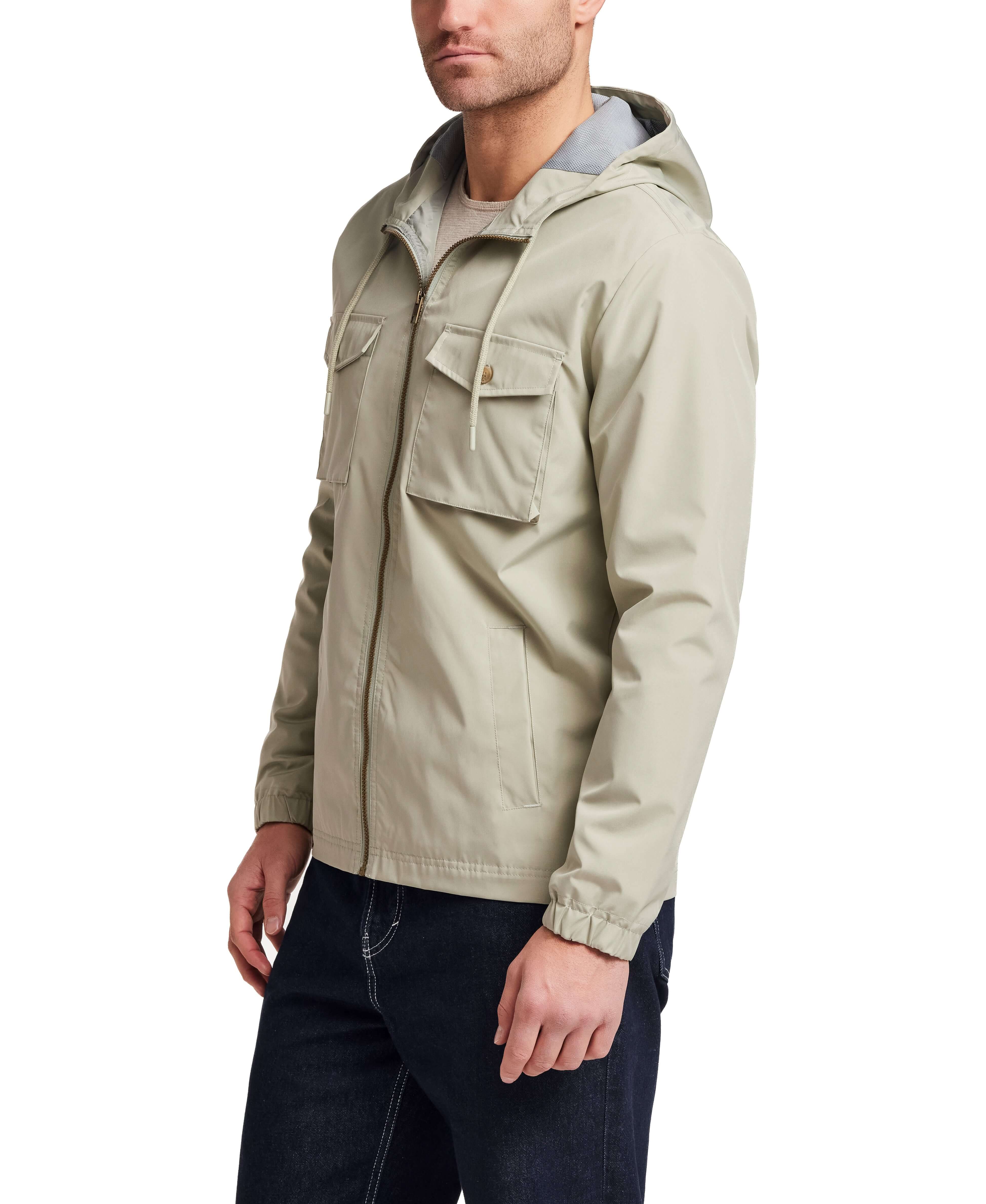 Poly Memory Safari Jacket with Hood in Sea Grass worn by a model, showcasing its lightweight design and attached hood.