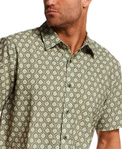 The Medallion Print Seersucker Shirt in Green featuring a subtle medallion pattern and structured collar.