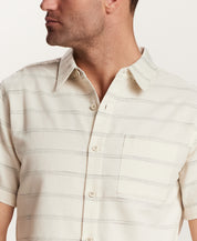 Textured Horizontal Stripe Button-Down Shirt in Turtle Dove worn by a man, showcasing a relaxed fit and vintage style.