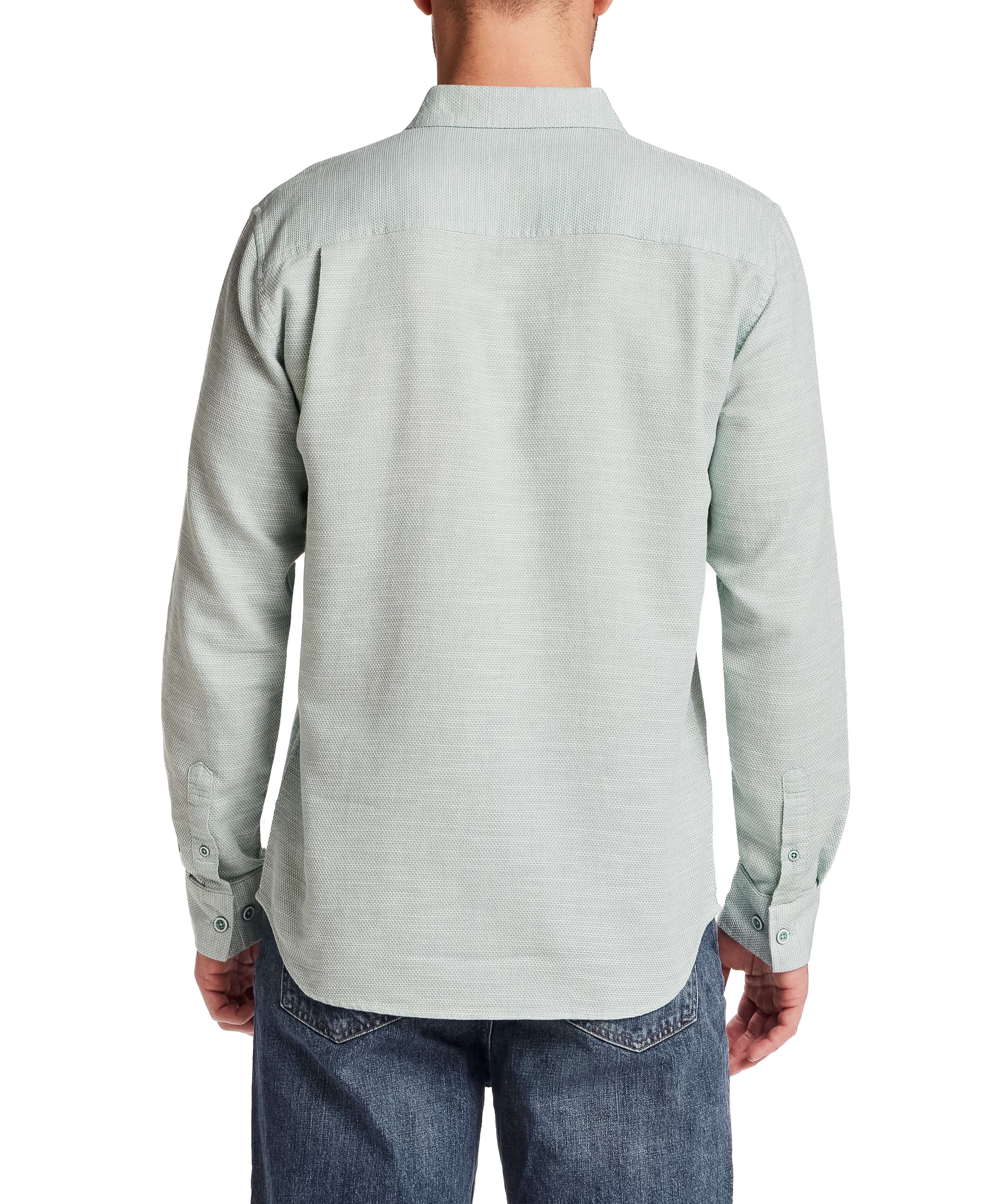 Back view of a man wearing Pebble Dobby Button-Down Shirt in Sea Grass, showcasing the textured cotton fabric and regular fit.