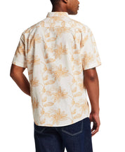 Model showcasing the back of a 100% Cotton Linen-Texture Shirt in Sunrise with floral pattern.