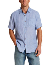 Short Sleeve Linen Shirt in Infinity Blue worn by a model with a standard fit and short sleeves.
