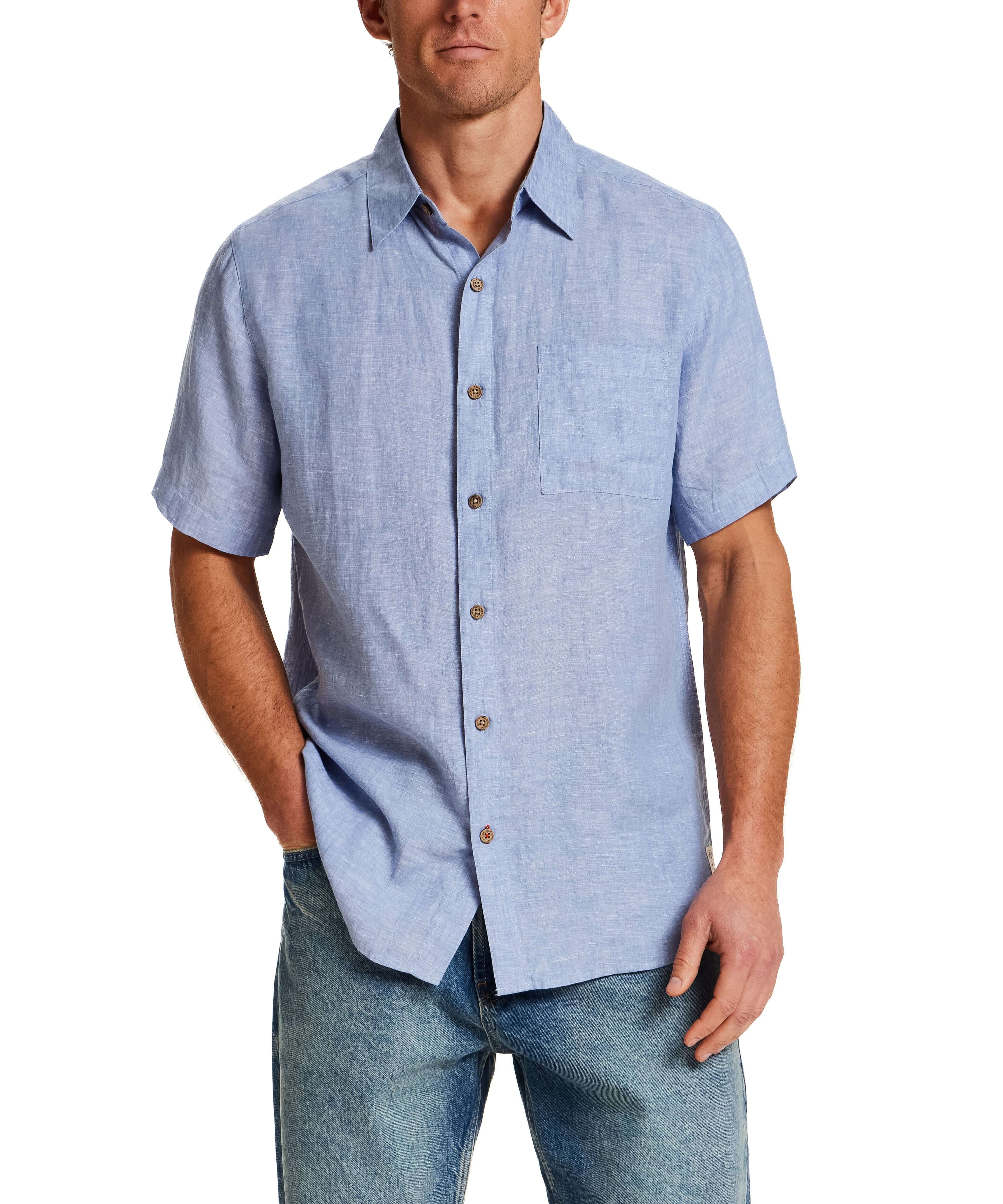 Short Sleeve Linen Shirt in Infinity Blue worn by a model with a standard fit and short sleeves.