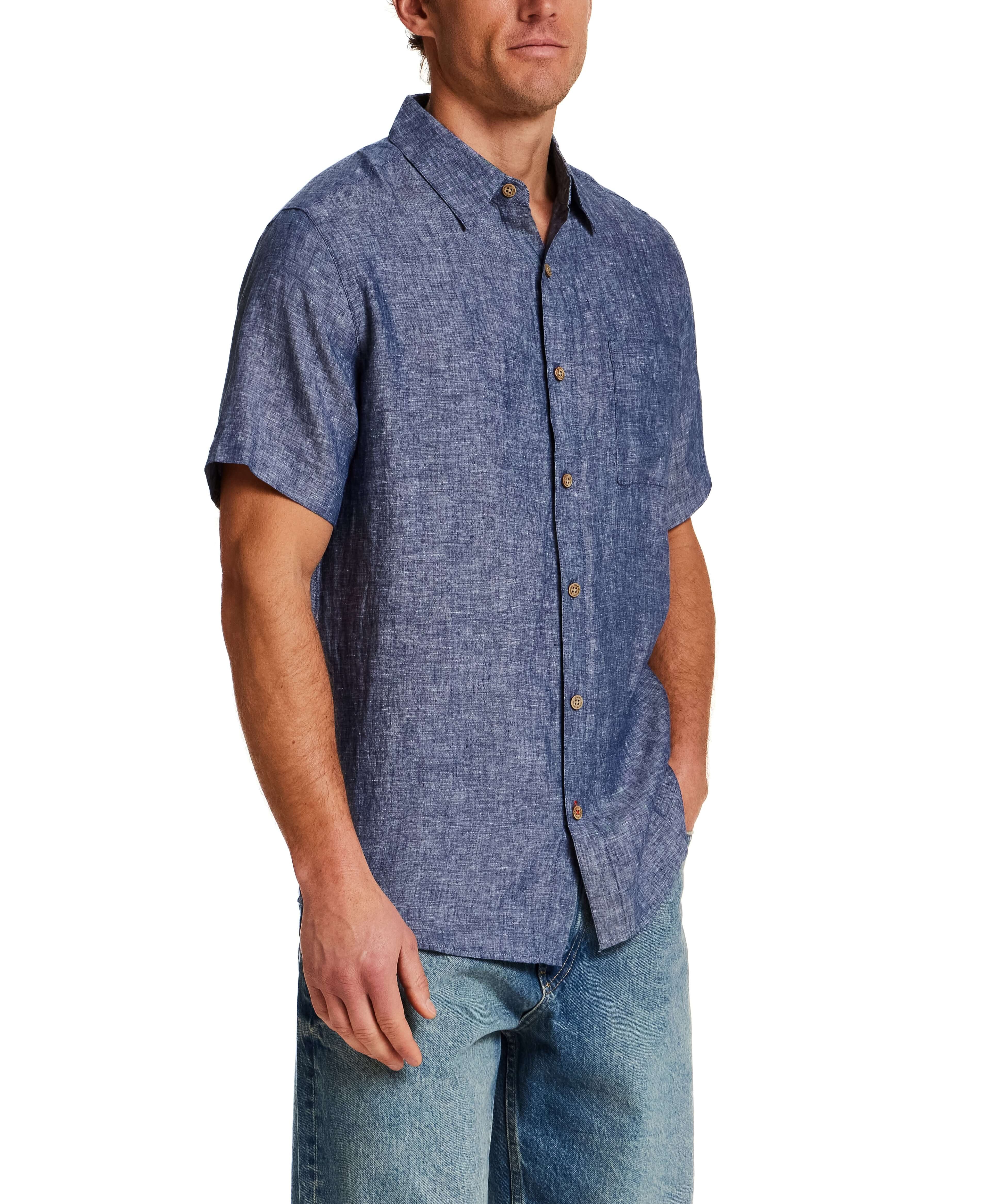 Short Sleeve Linen Shirt in Navy, featuring a classic fit and button closure, styled with denim jeans.