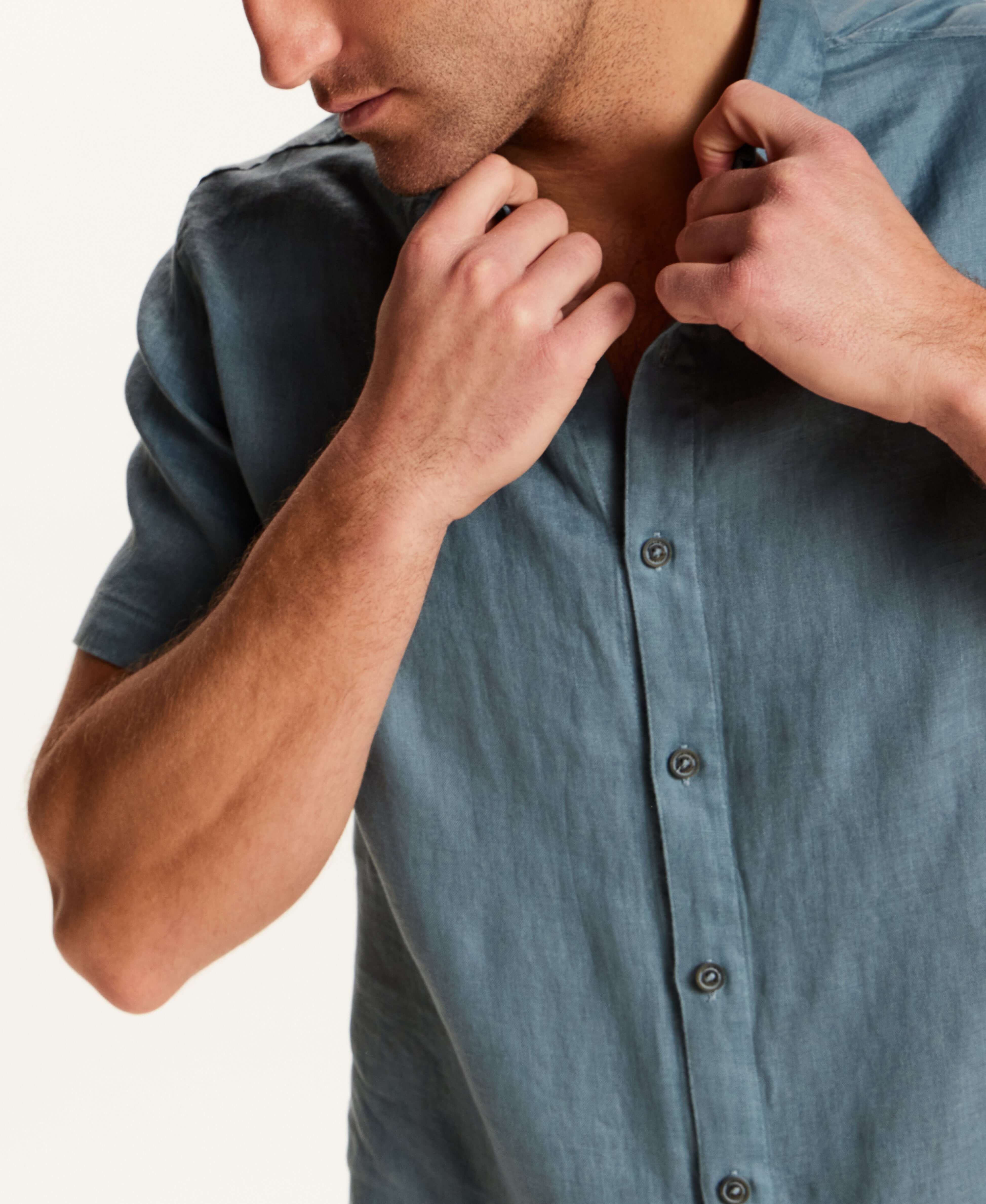 Short-Sleeve Linen Shirt in Blue featuring a refined slate blue color and relaxed fit.