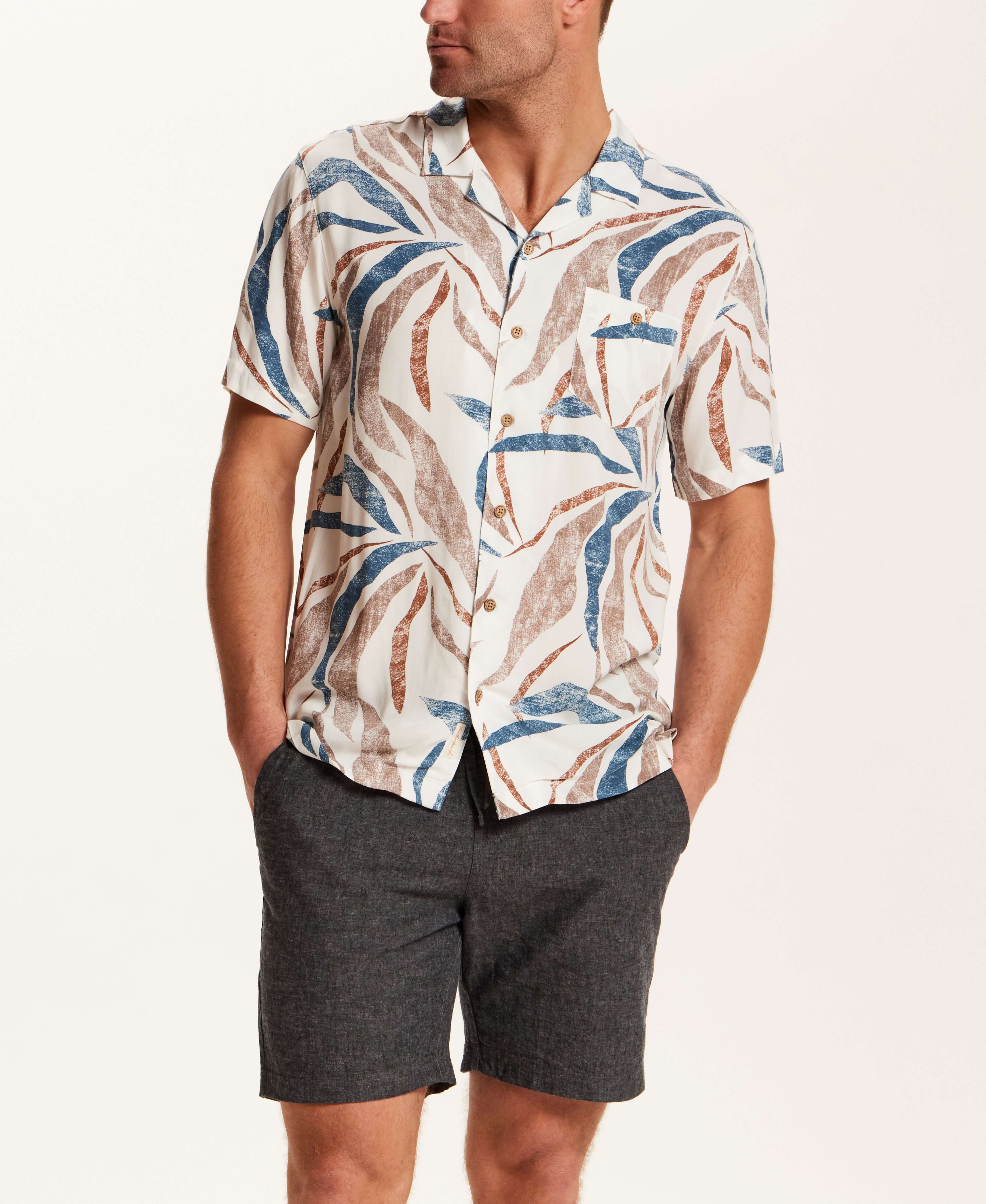 Short Sleeve Rayon Printed Camp Shirt in Marsala featuring a retro leaf pattern and relaxed fit, styled with shorts.