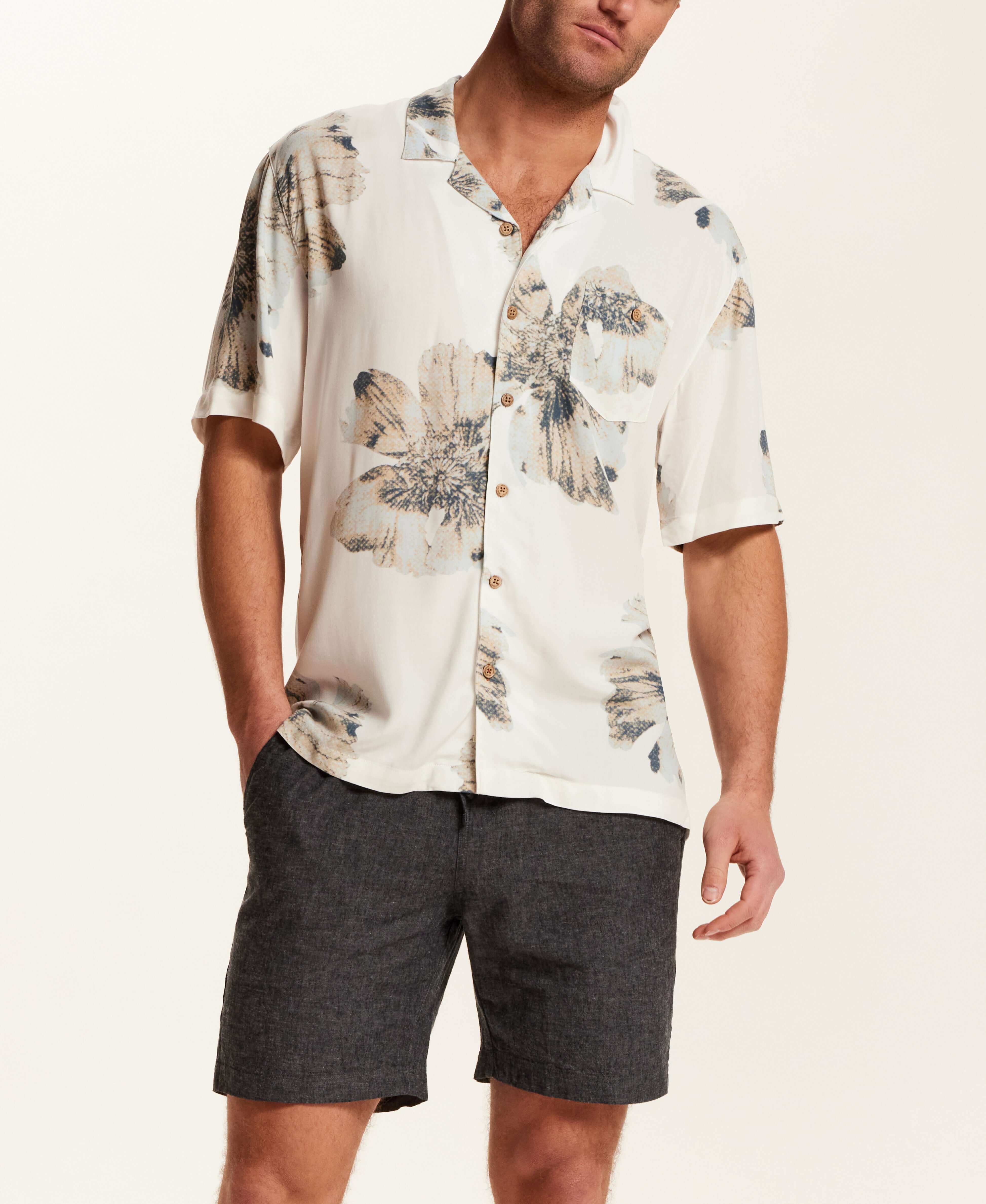 Short Sleeve Rayon Printed Camp Shirt in Putty on model, styled with shorts and showcasing a trendy camp collar.