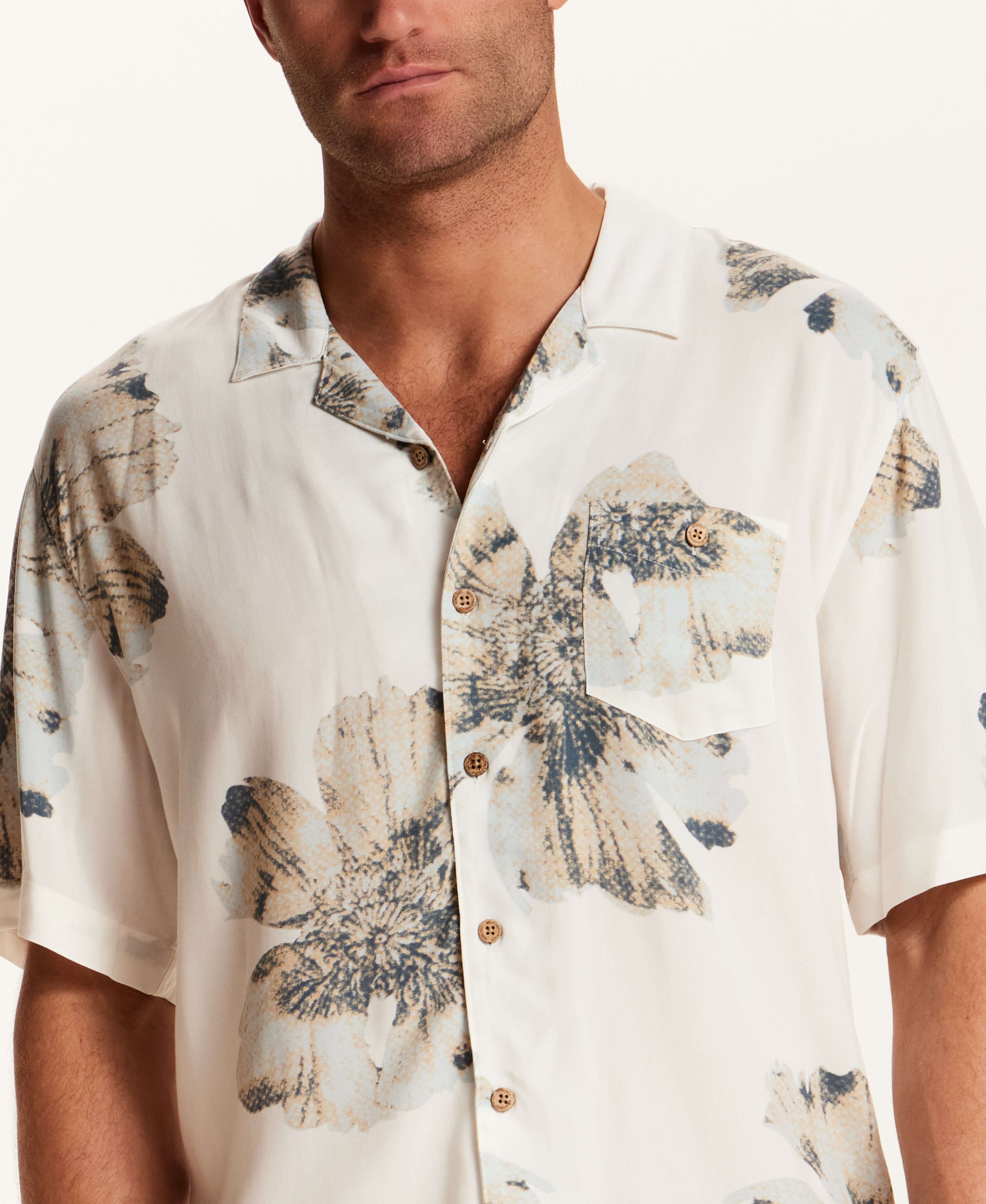 Short Sleeve Rayon Printed Camp Shirt in Putty worn by a model, showcasing a retro floral pattern and camp collar.