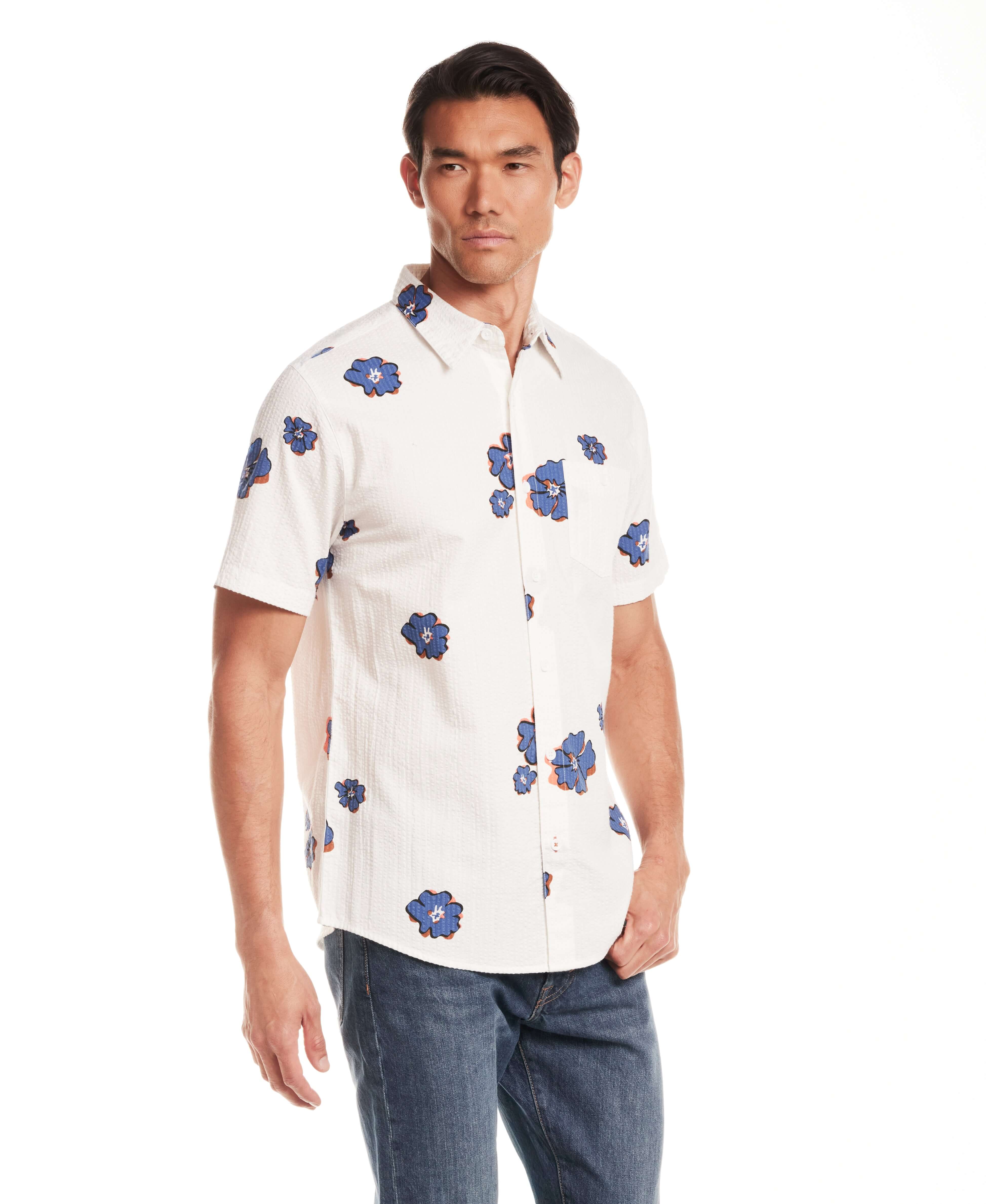 Short Sleeve Seersucker Print in Victoria Blue worn by a model, showcasing a breathable, textured design with an allover print.