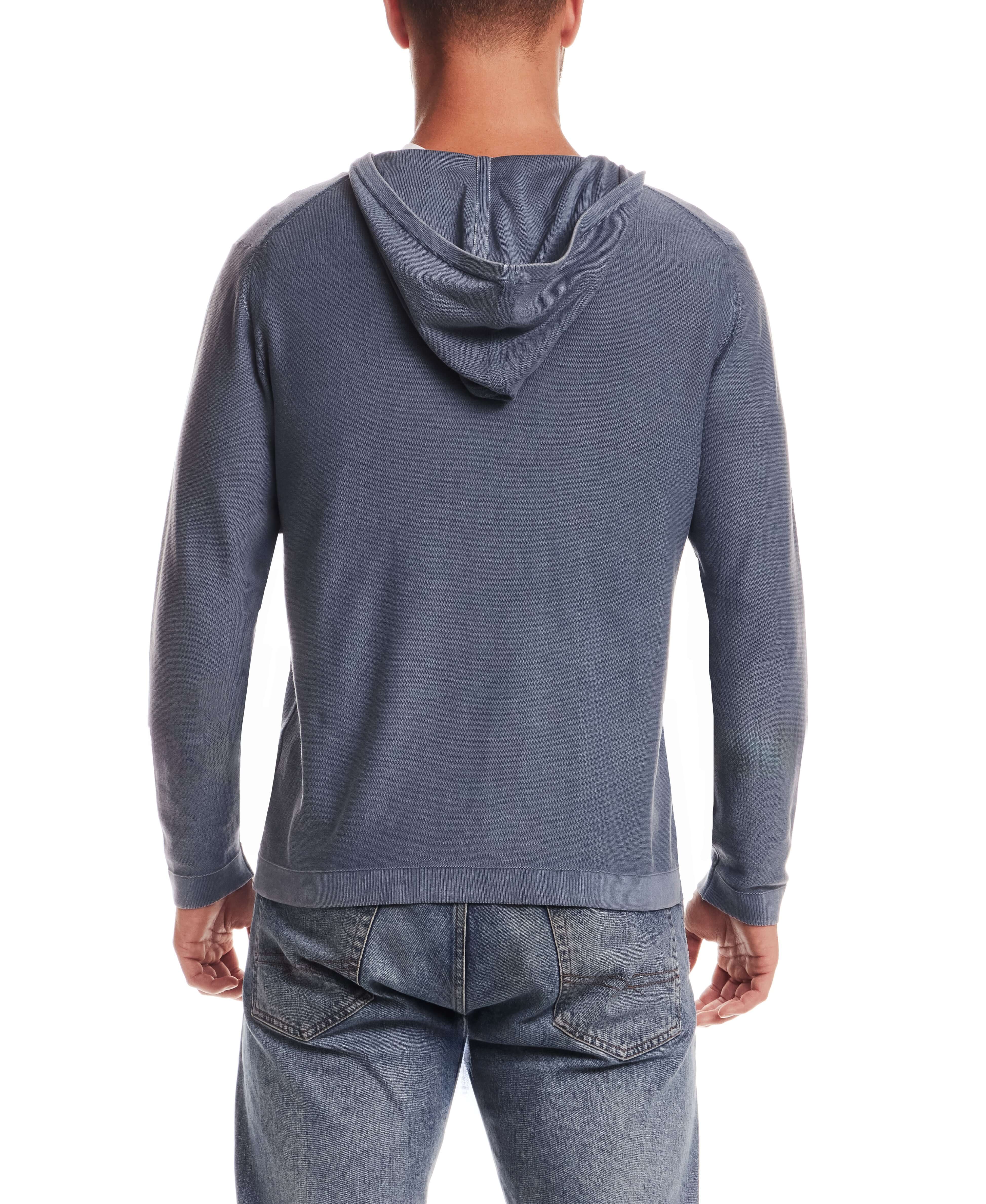 Back view of a man wearing the Stonewash Hooded Sweater in Insignia Blue, featuring a relaxed fit and soft fabric.