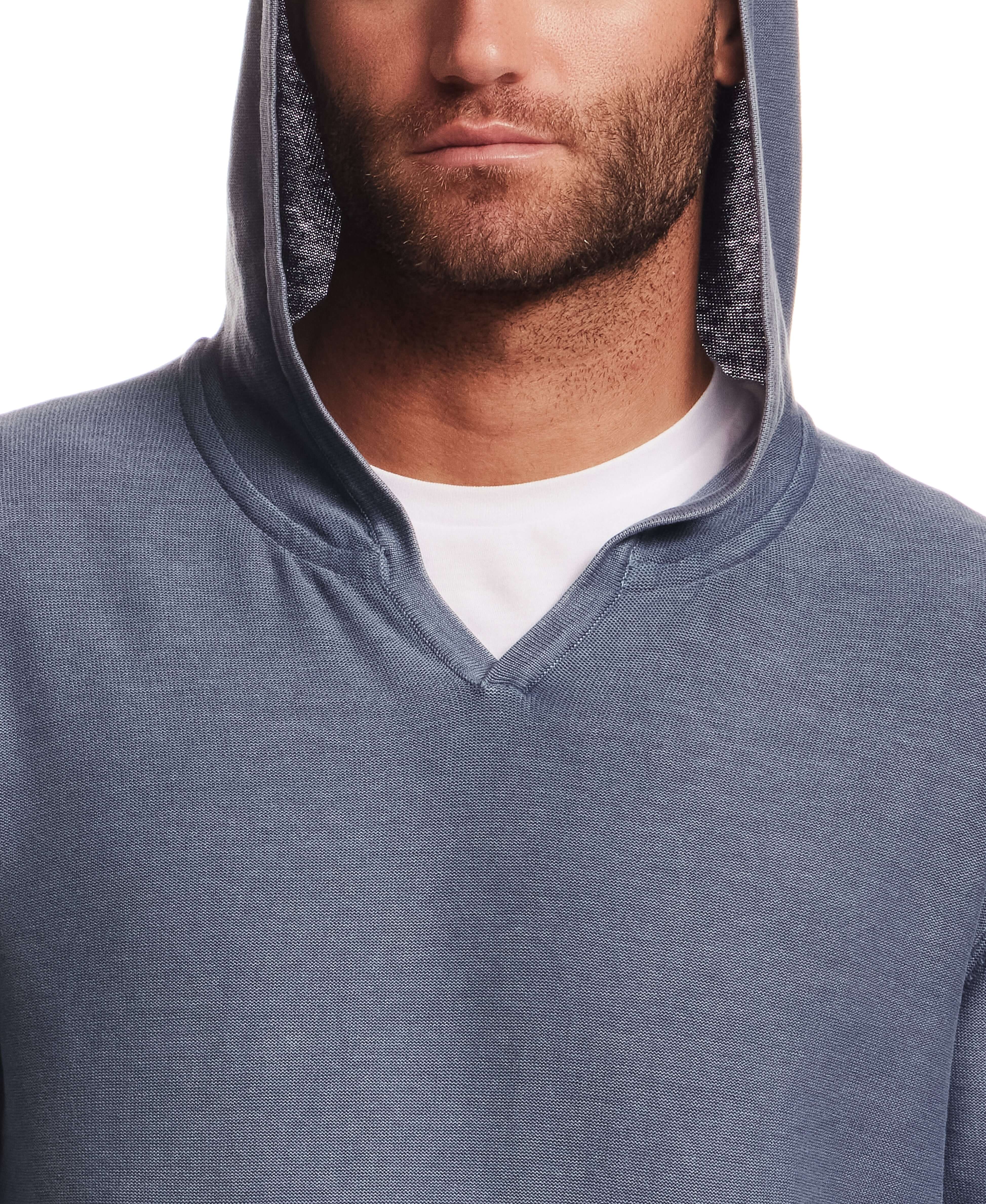 Stonewash Hooded Sweater in Insignia Blue featuring a V-neck hood and relaxed fit on model.