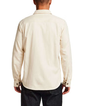 Back view of The Utility Shirt in Natural, showcasing its classic design and button detailing.