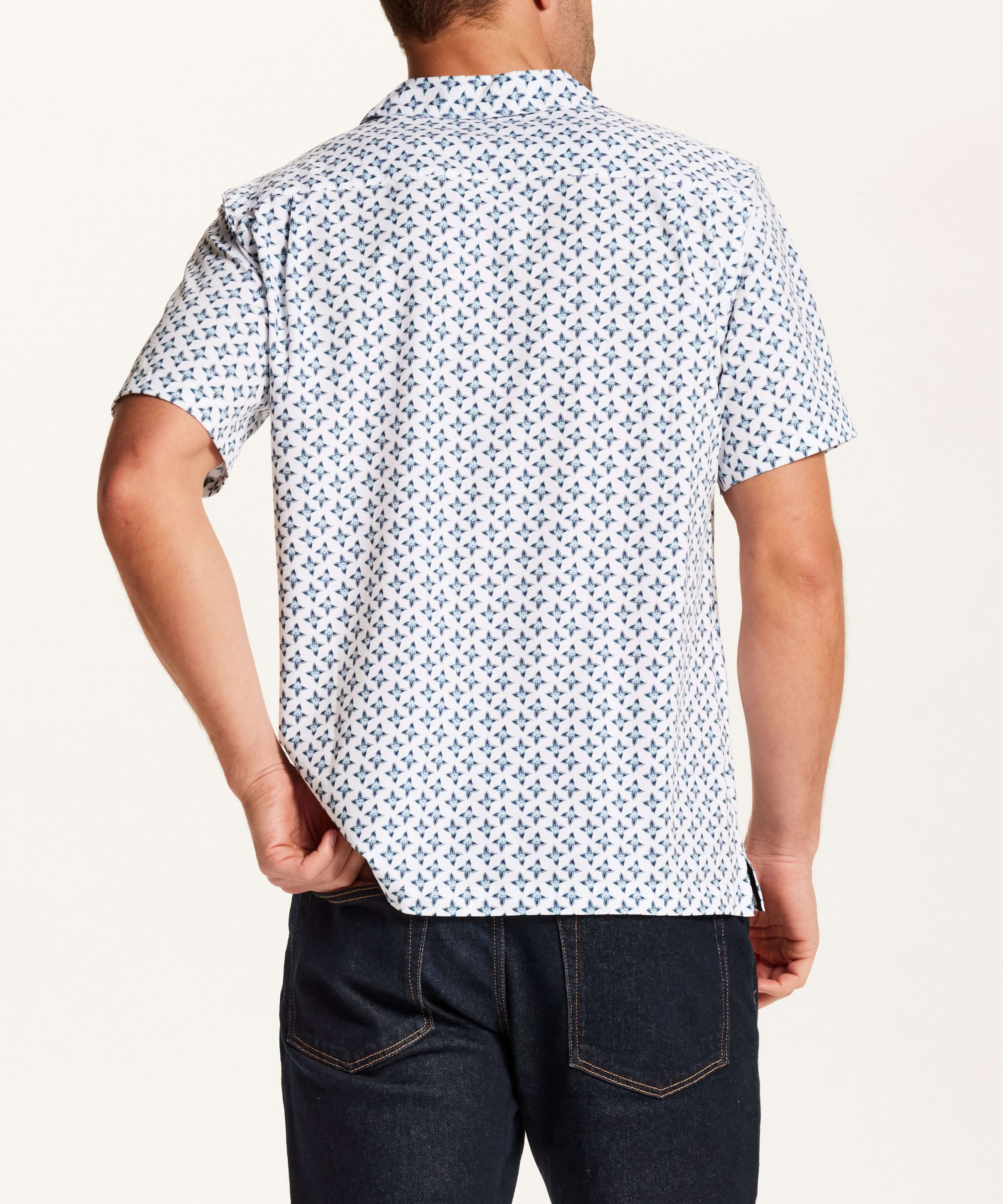 Floral Seersucker Shirt in White showcasing the back view, featuring a navy floral medallion print on a white base.