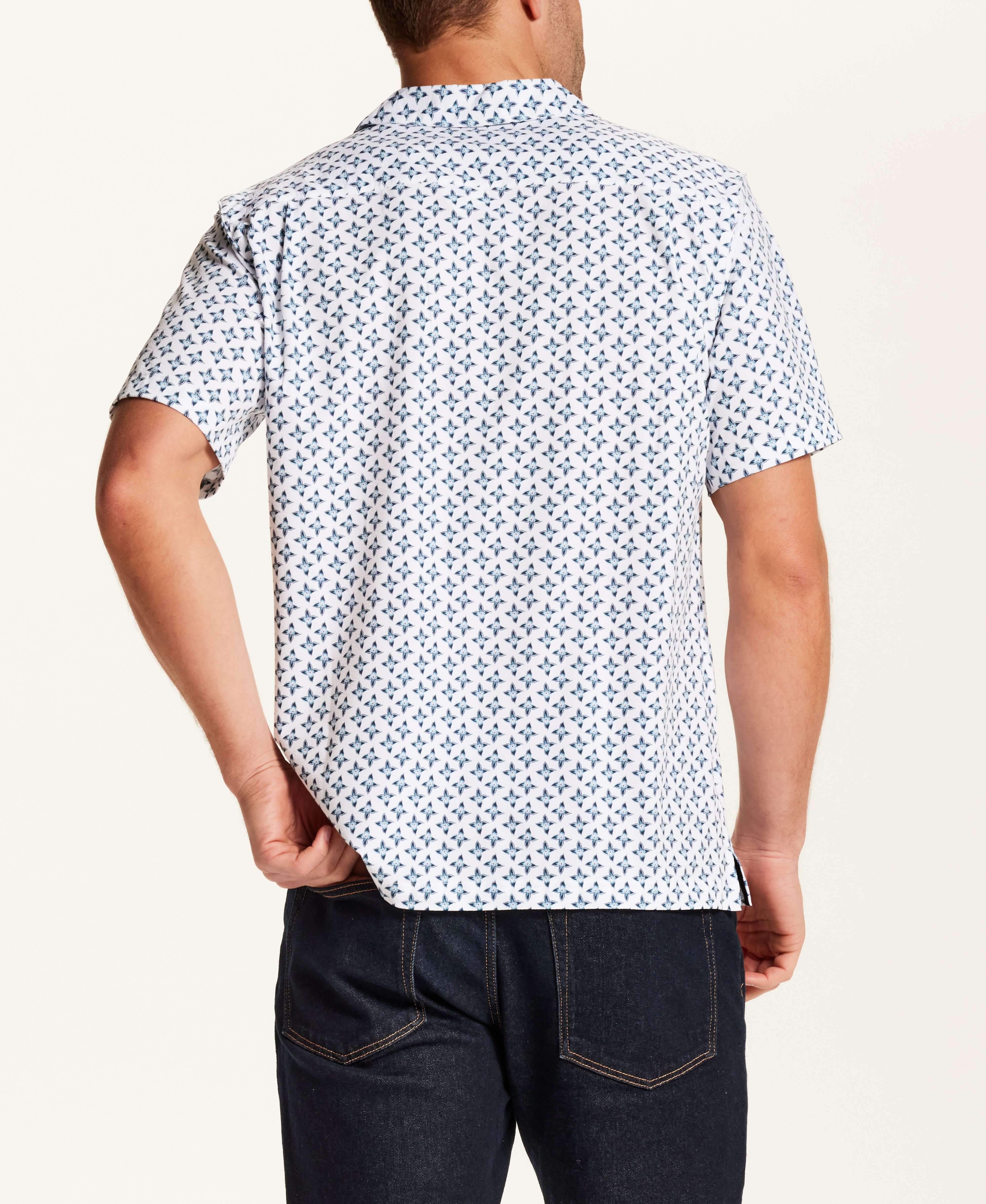 Floral Seersucker Shirt in White showcasing the back view, featuring a navy floral medallion print on a white base.